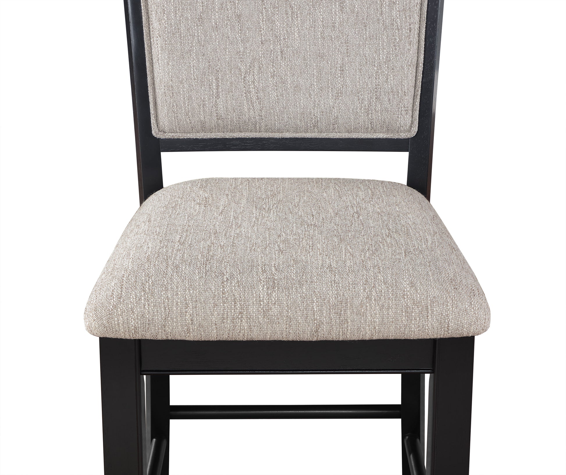 Closeup of a textured beige upholstered seat on a dark wood bar stool