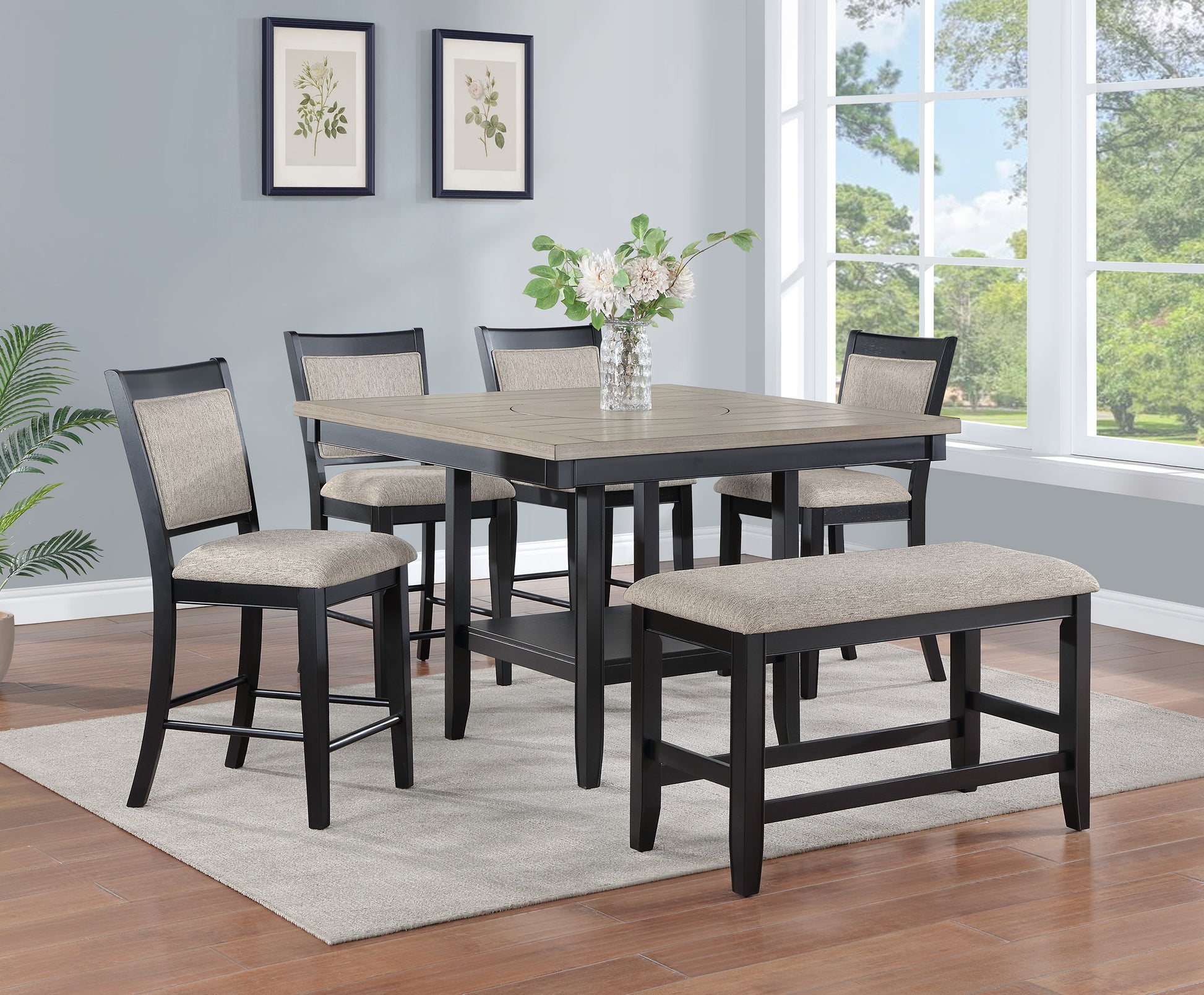 Black wood counter height dining table with neutral upholstered seats