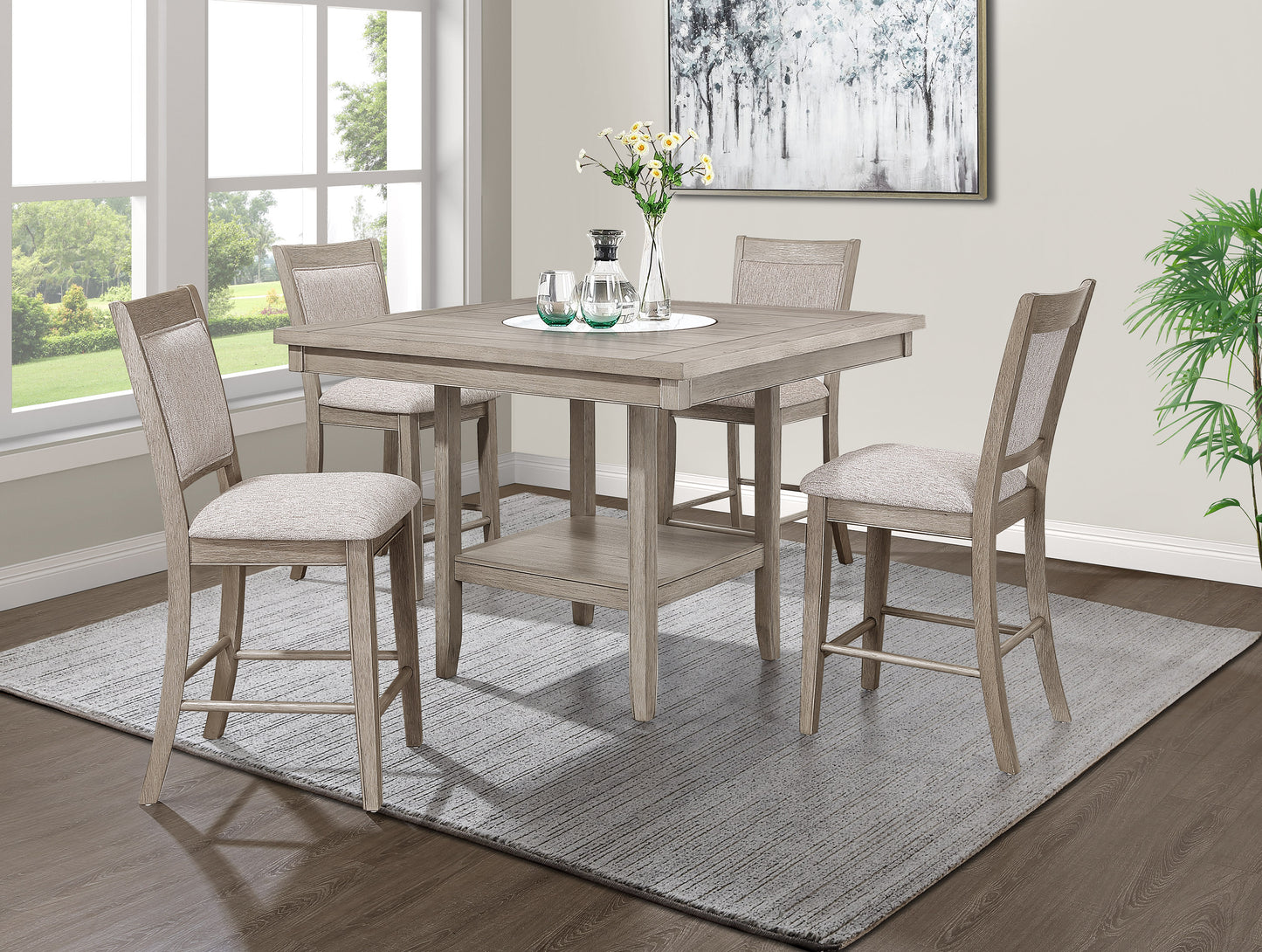 Gray wash wood counter height table with four upholstered chairs