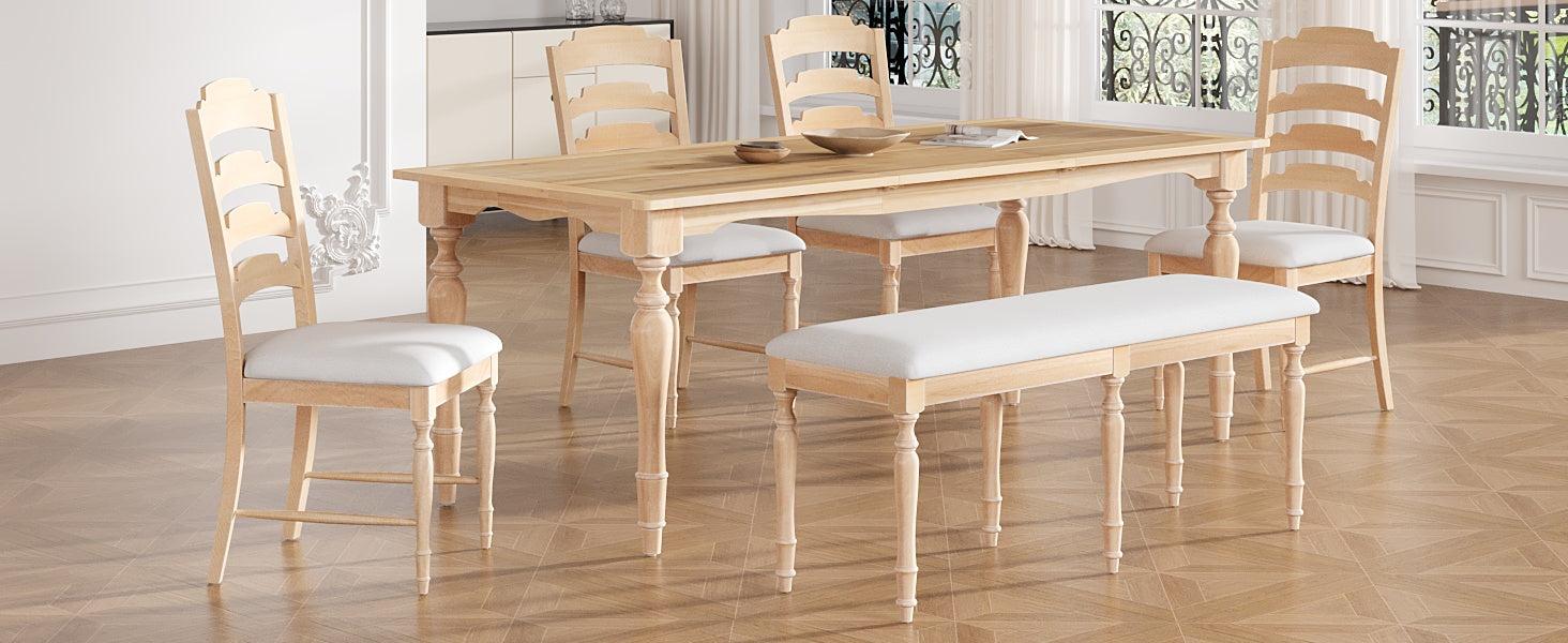 Light oak dining chairs with curved ladder backs and white upholstered seats