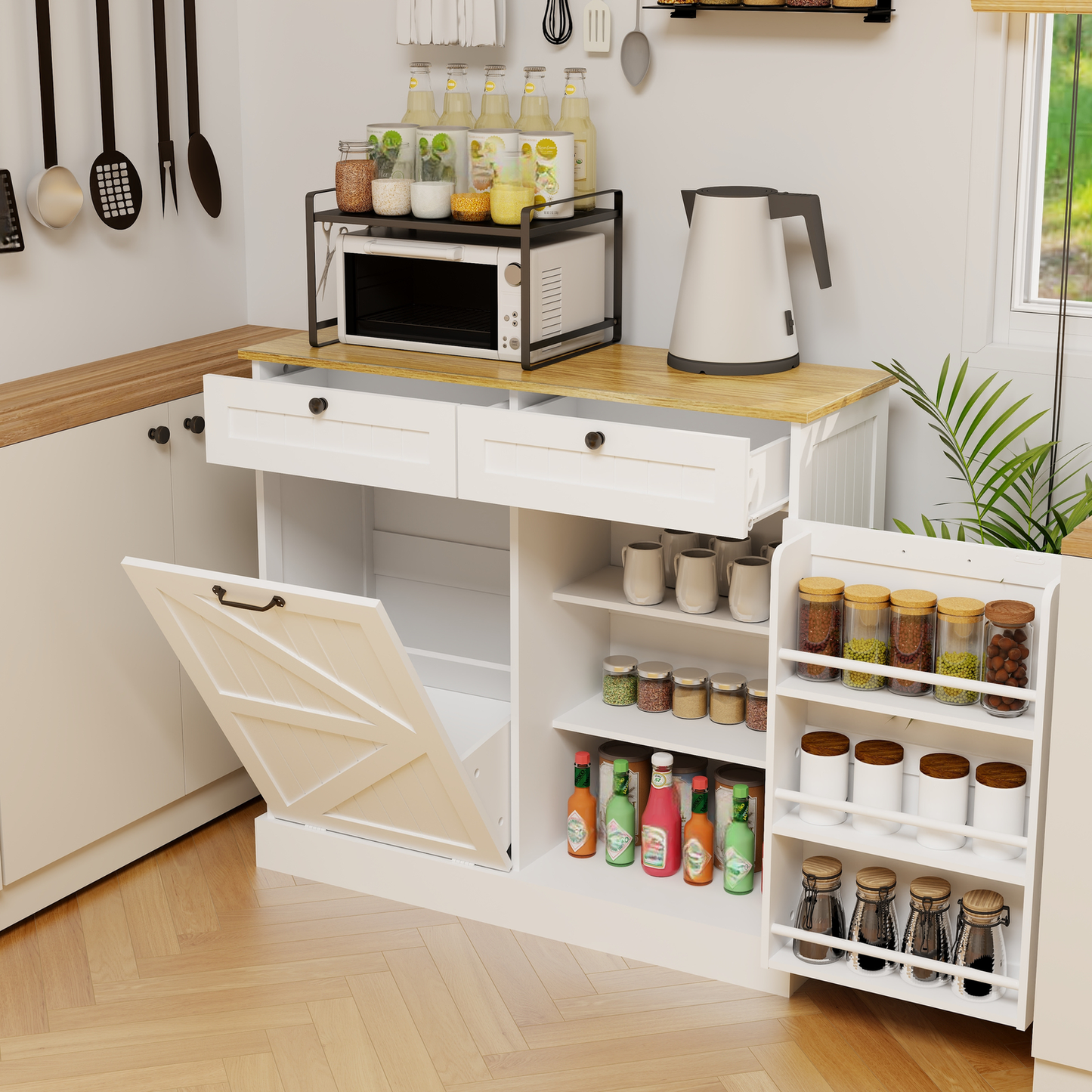 White microwave with black trim on a metal stand in a kitchen