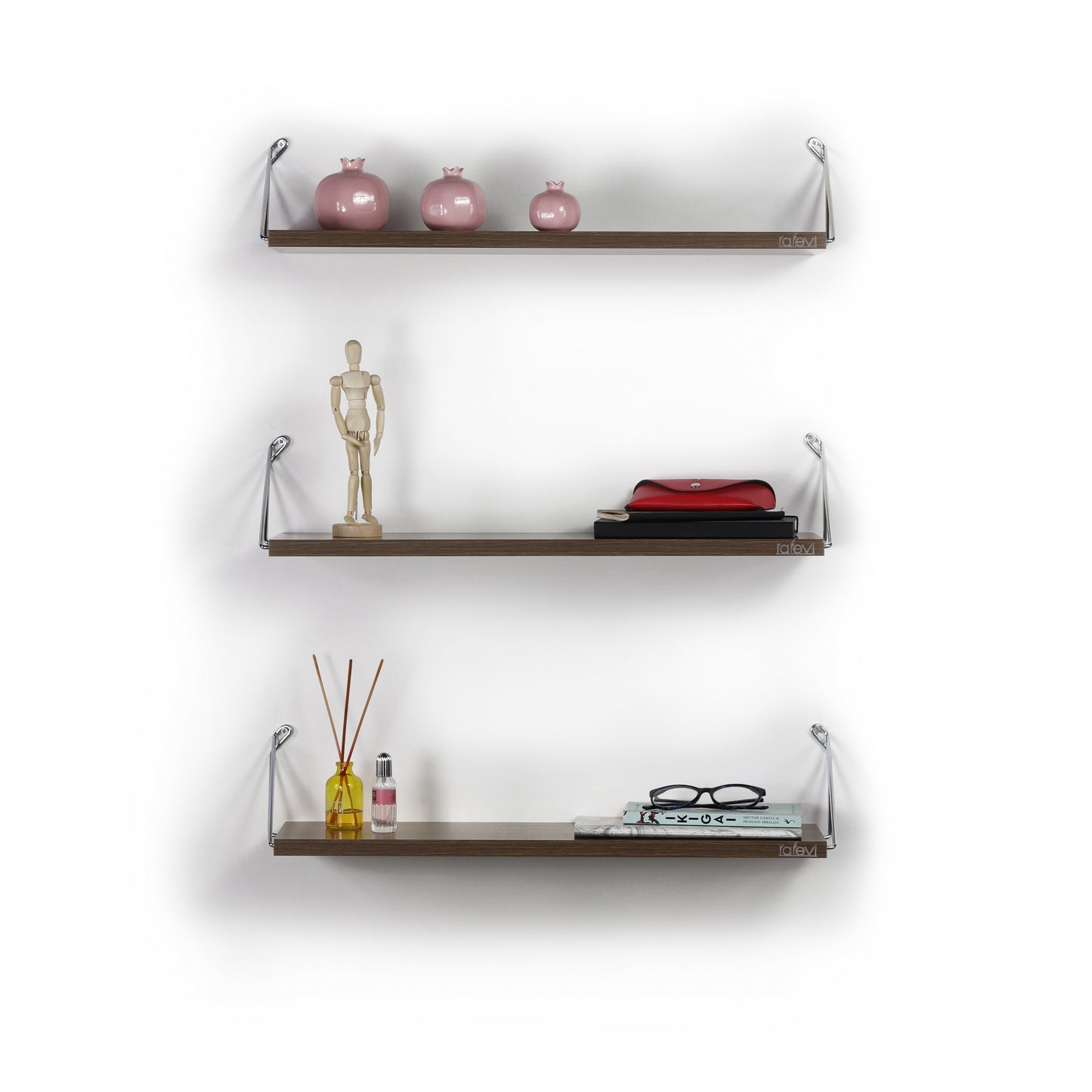 Set of three blush pink ceramic pomegranateshaped decorative vases