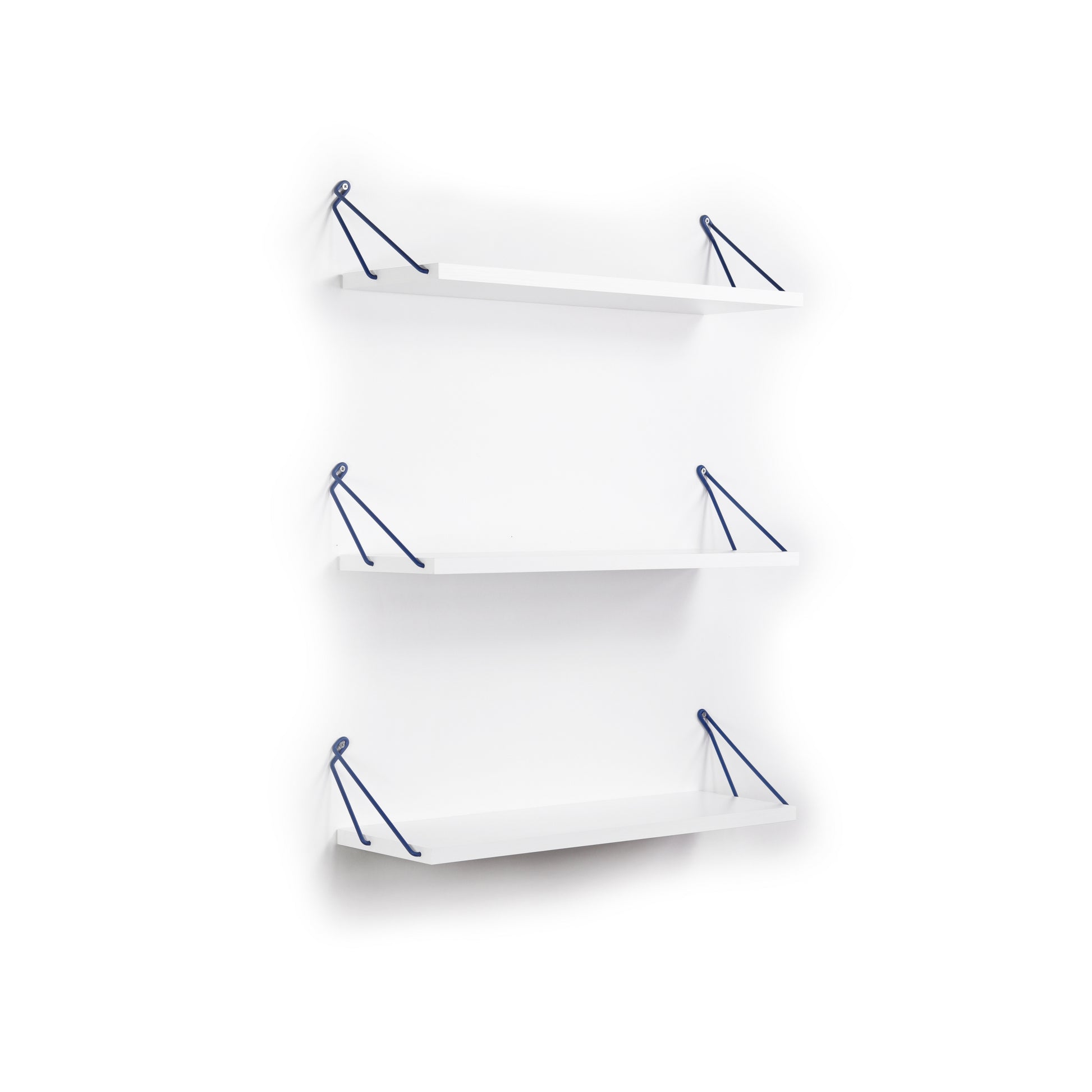 White wall shelves with blue metal supports
