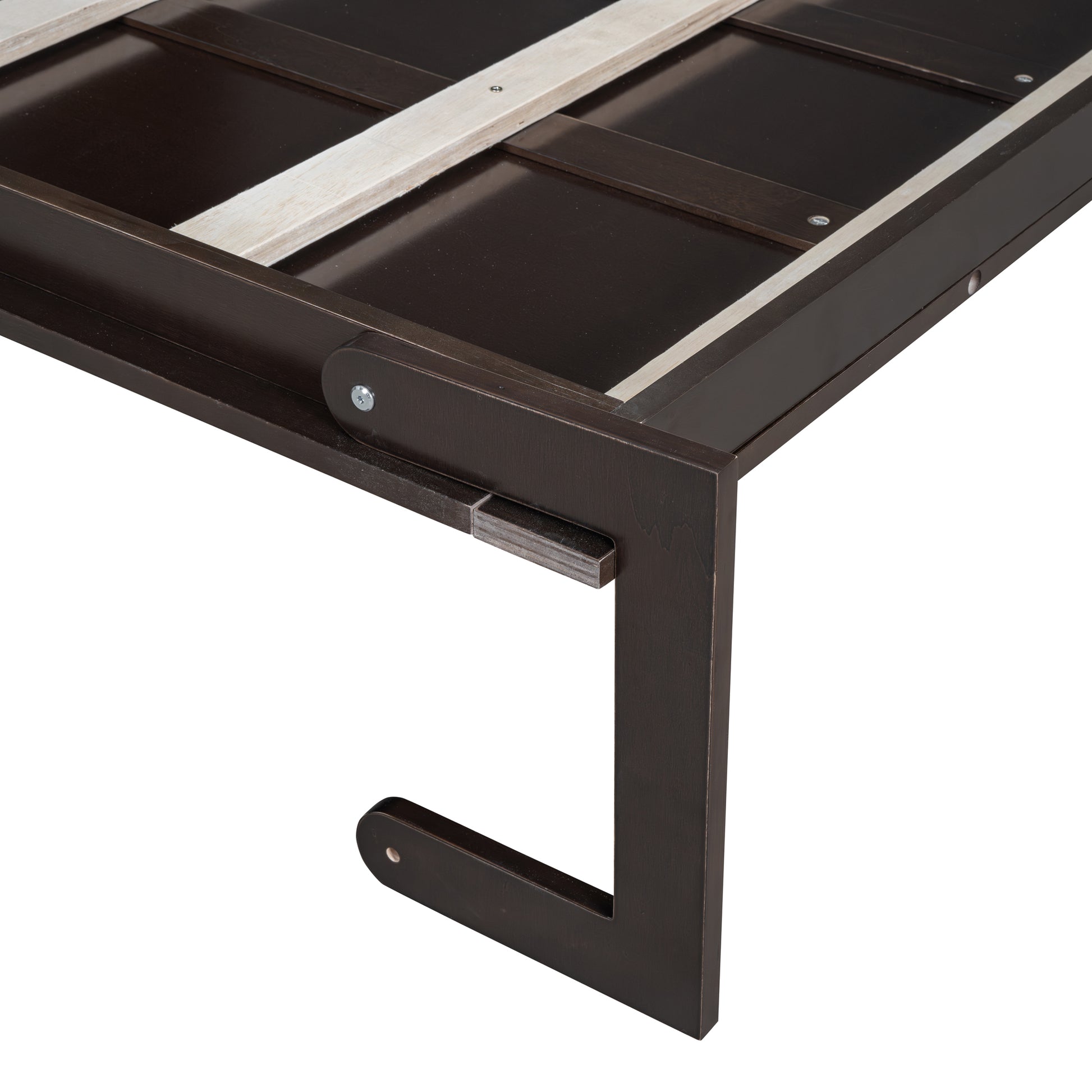 Dark brown wooden bed frame corner detail with support slats visible
