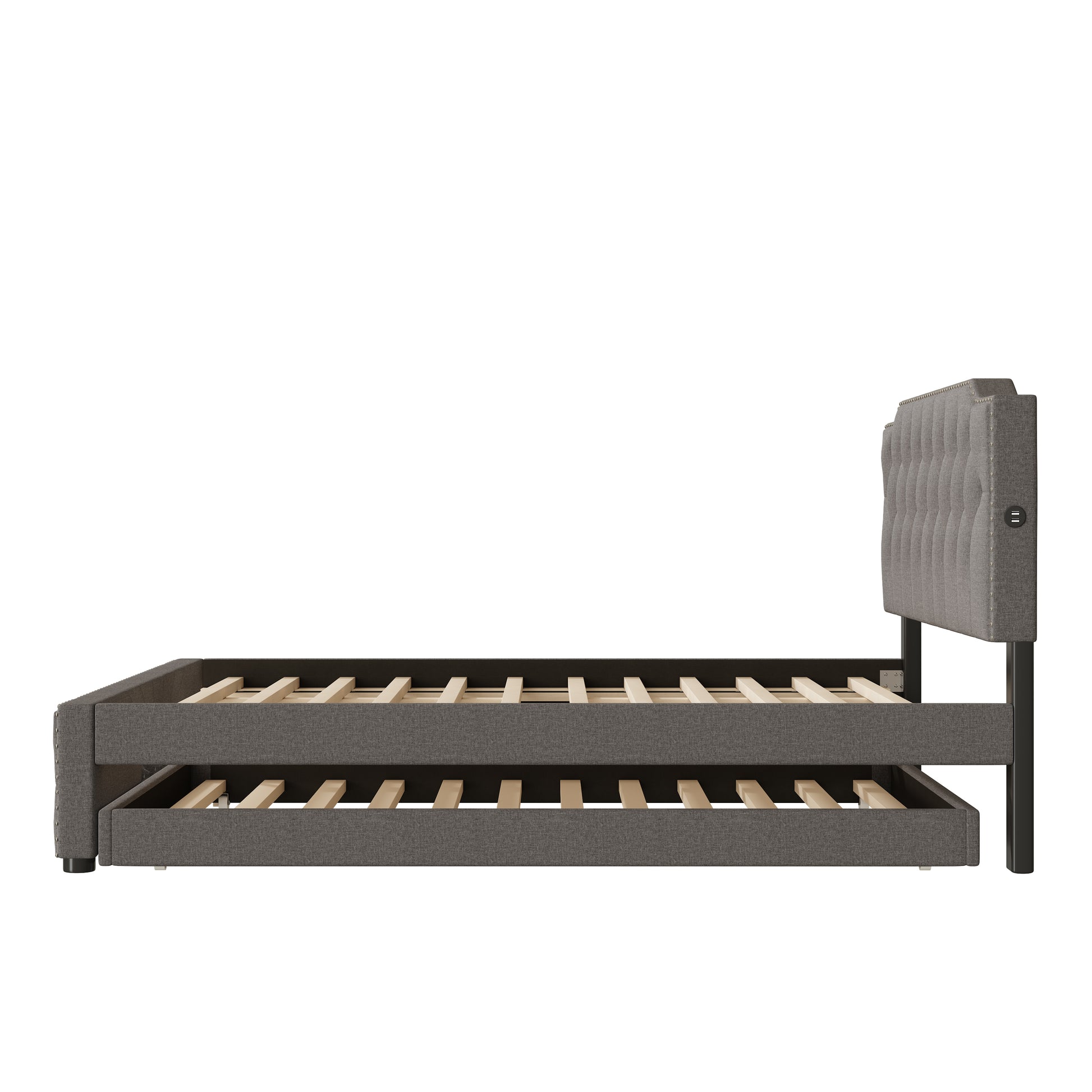 Gray upholstered twin daybed with pullout trundle and button tufted headboard