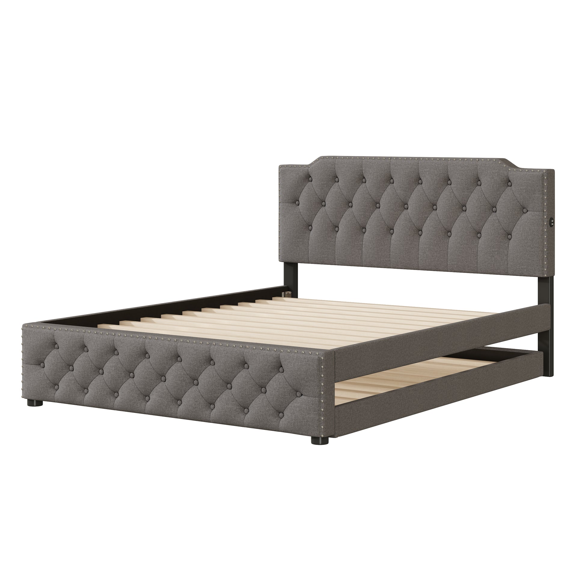 Grey tufted upholstered bed frame with nailhead trim and wooden slats