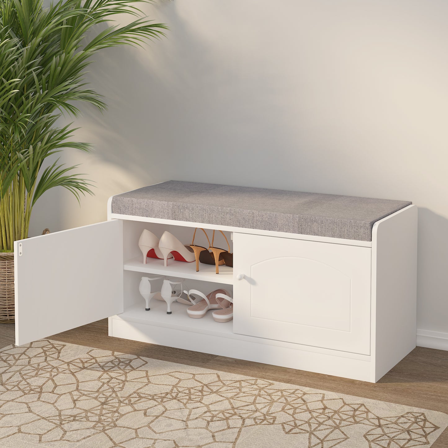 White shoe cabinet with grey upholstered top and shoe storage