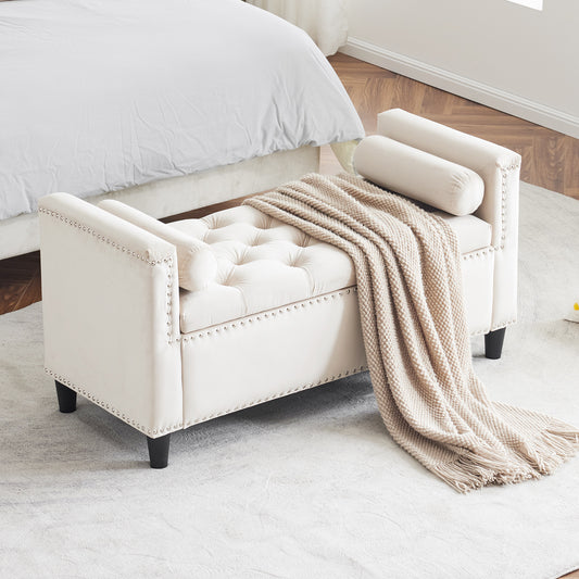Cream velvet tufted storage bench with silver nailhead trim