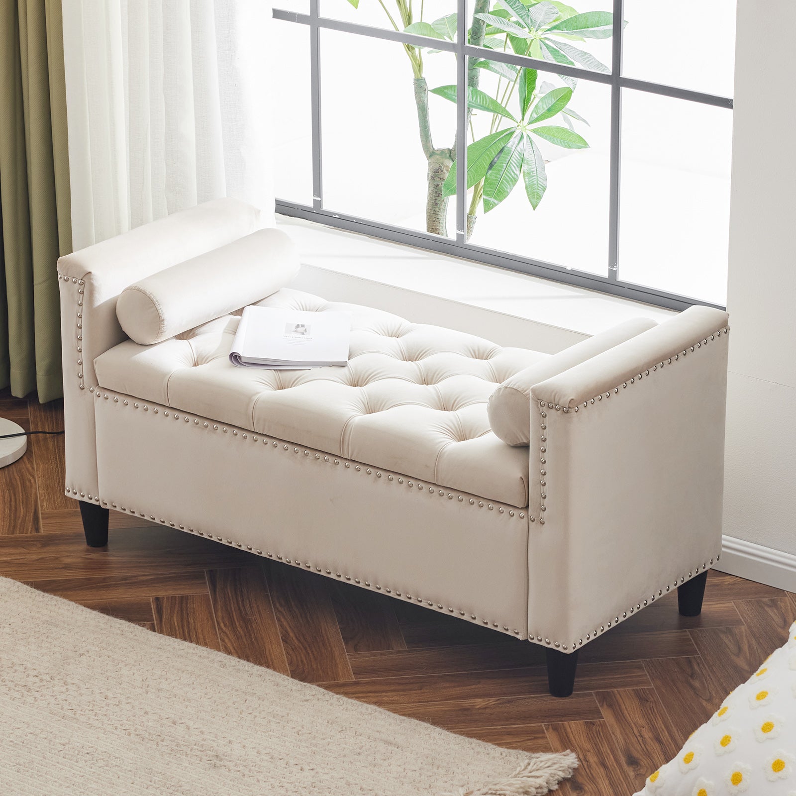 Cream velvet storage bench with tufted seat and silver nailhead trim