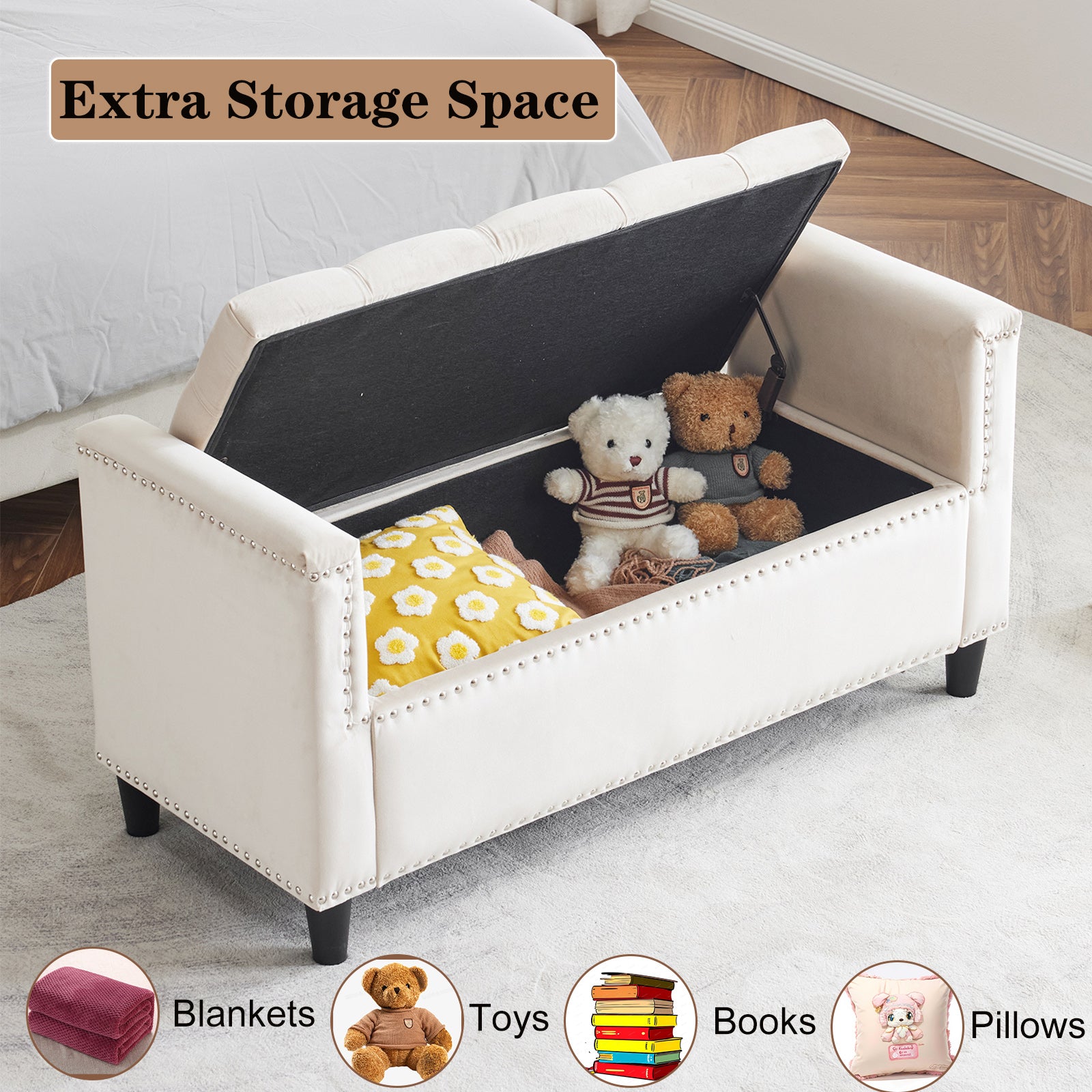 Cream tufted storage ottoman with silver nailhead trim storing plush toys and pillows
