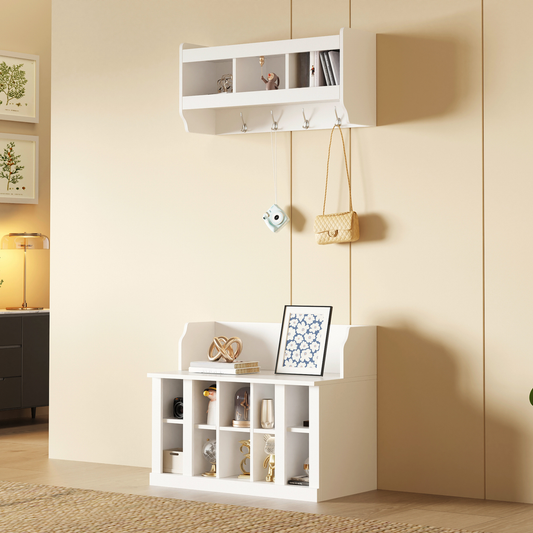 White entryway organizer with multiple cubbies and hooks