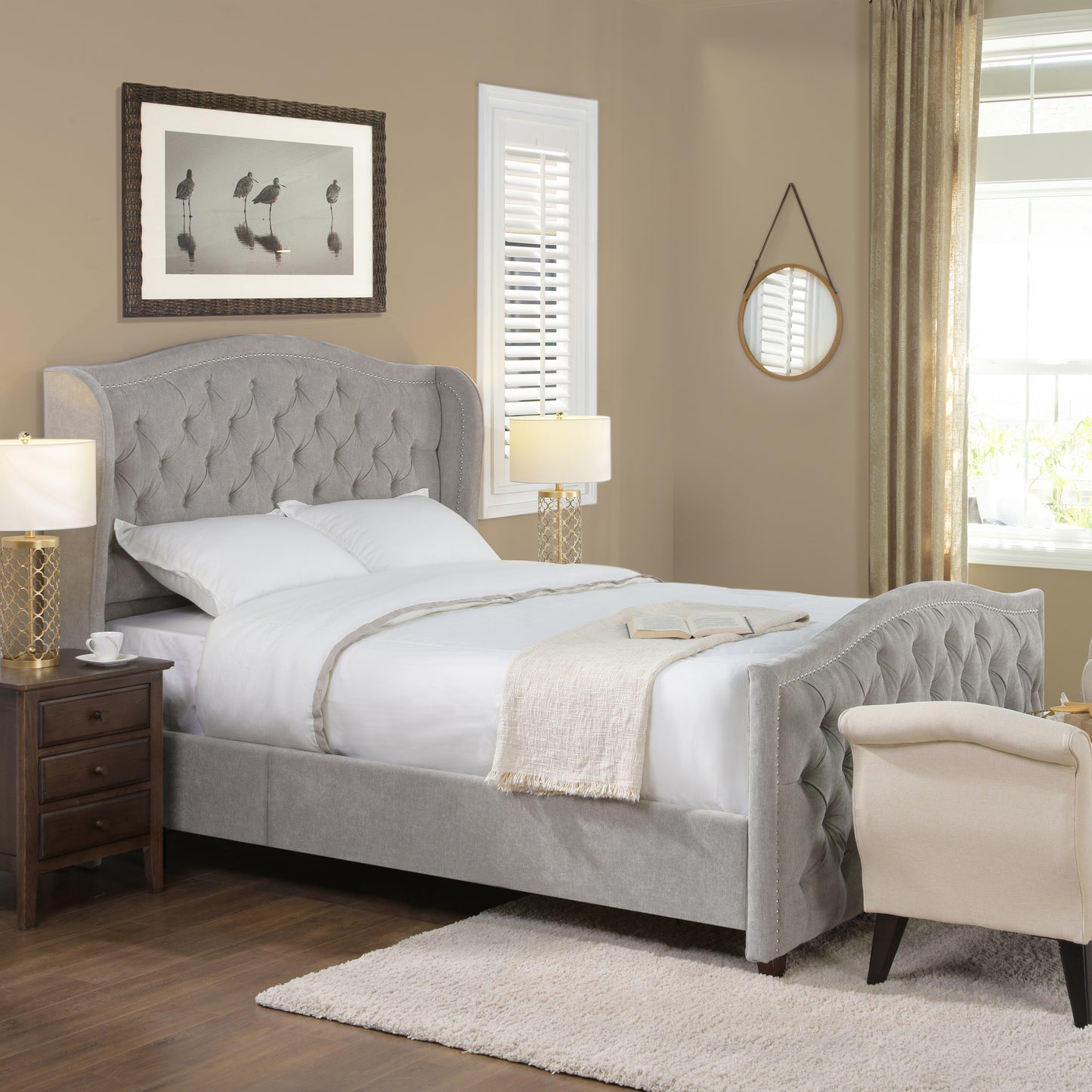Grey tufted wingback bed frame with silver nailhead trim