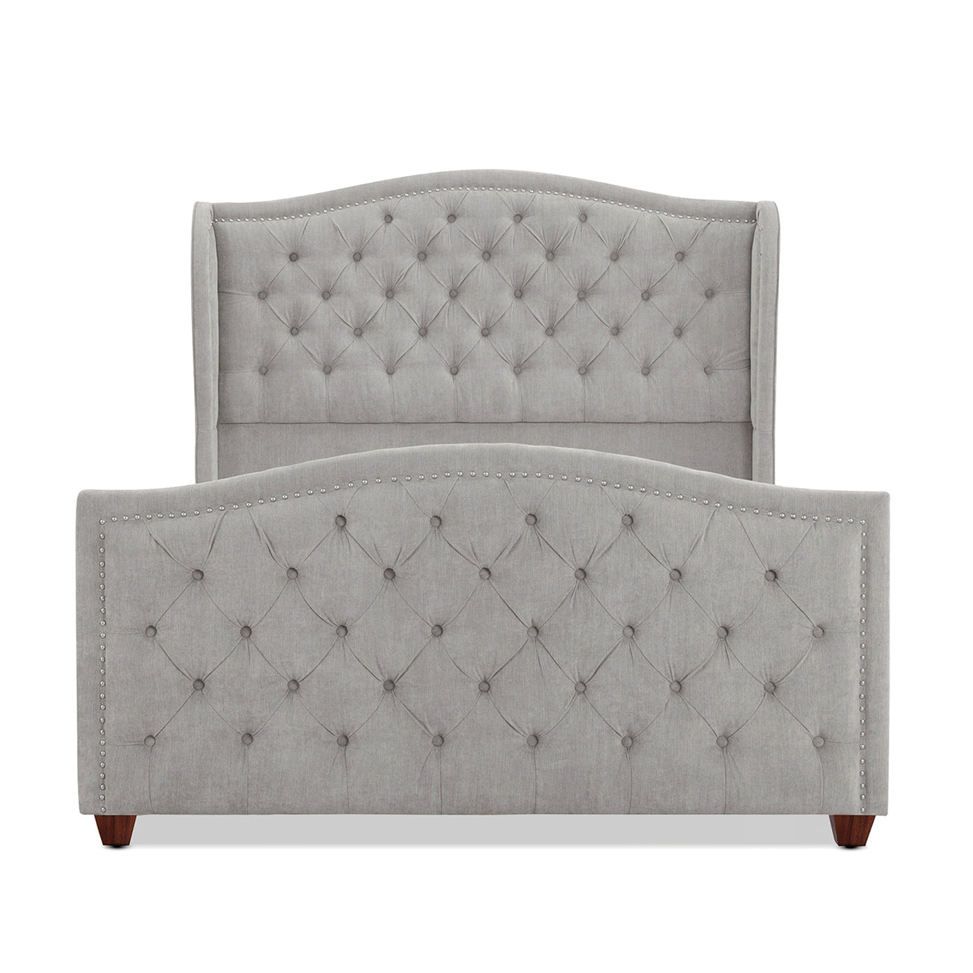 Gray tufted wingback bed frame with silver nailhead trim