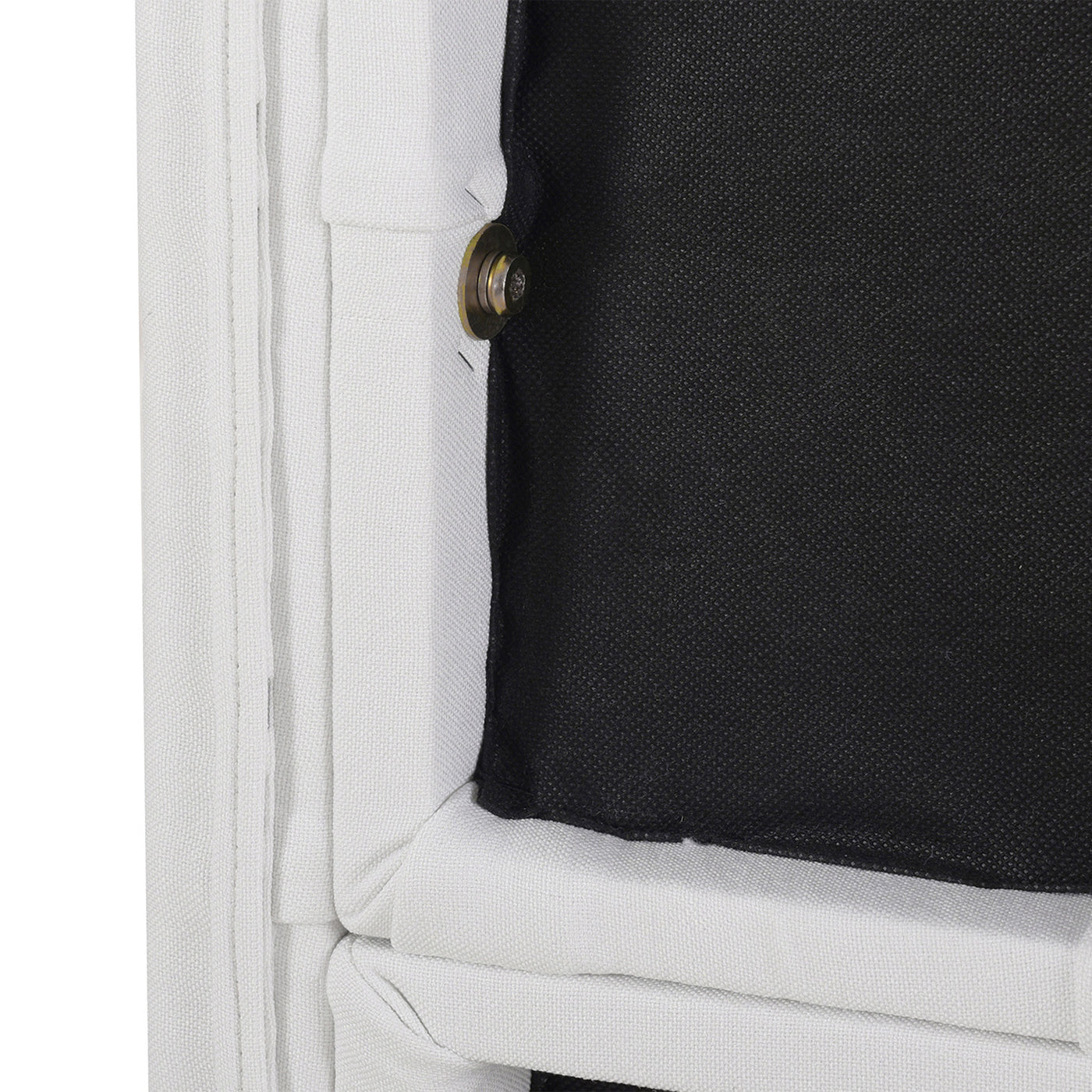 Closeup of white textured fabric folds with visible metal hardware and black interior lining