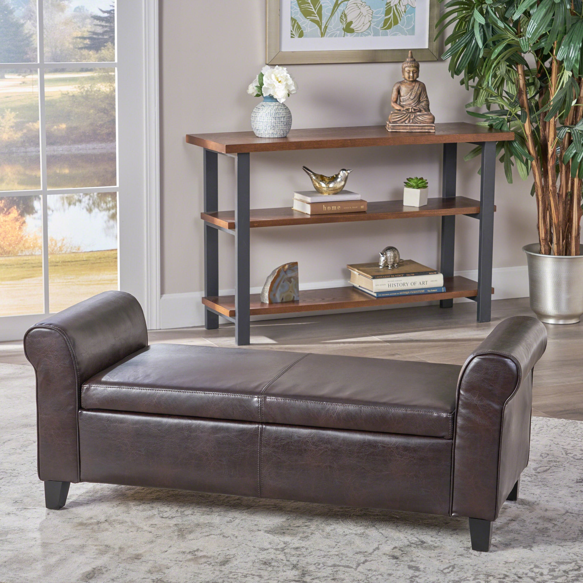 Dark brown faux leather storage bench with tufted seat and rolled arms