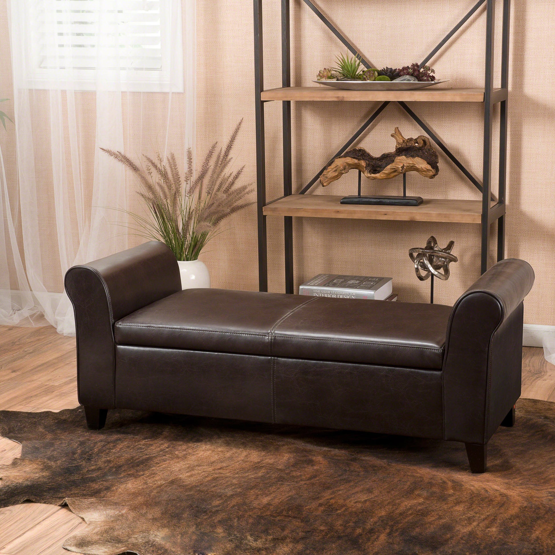 Dark brown faux leather storage bench with rolled arms