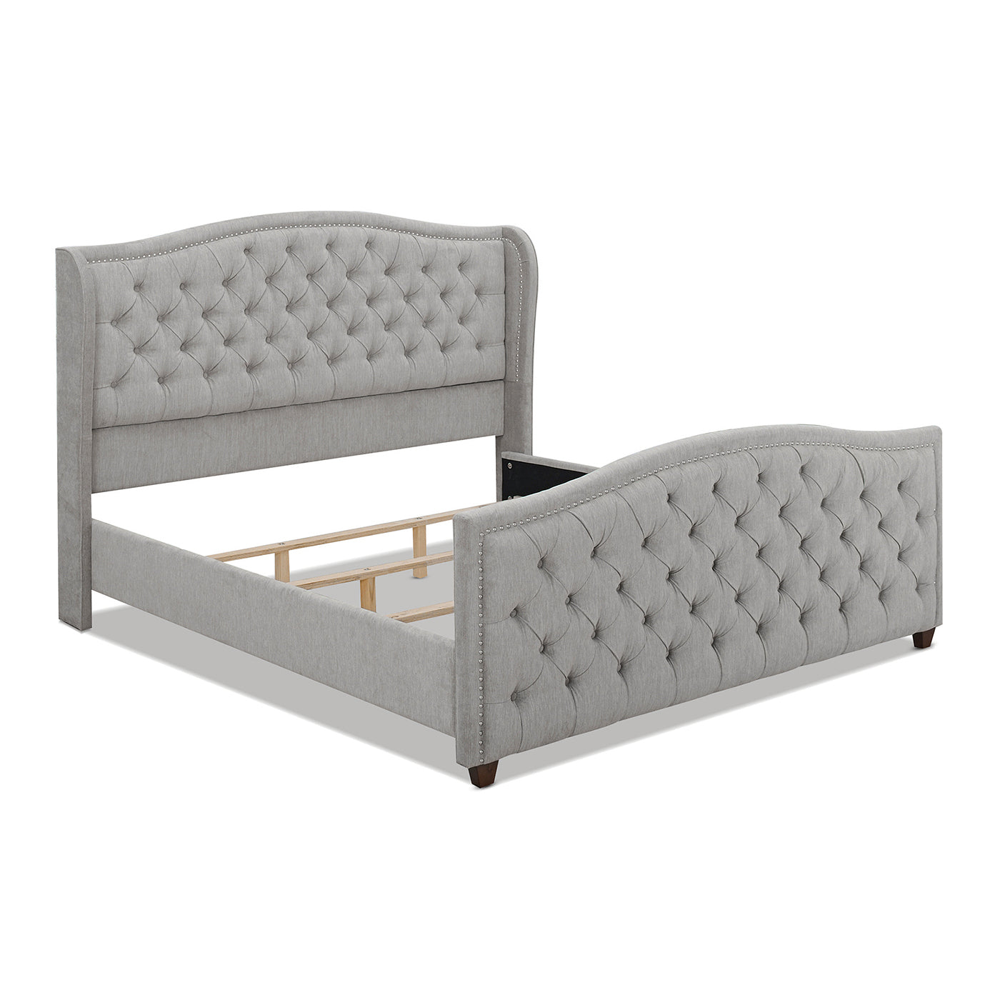 Gray tufted upholstered wingback bed frame with silver nailhead trim