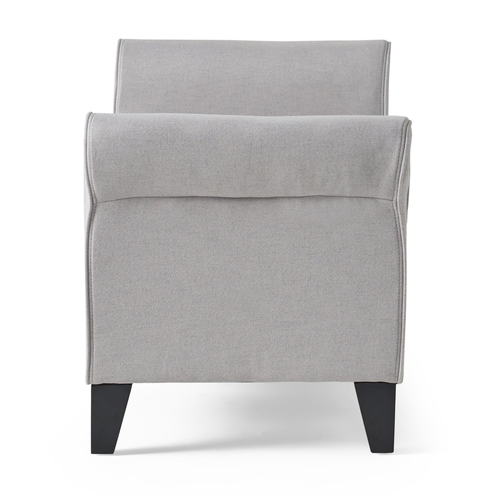 Grey upholstered bench with tapered black legs