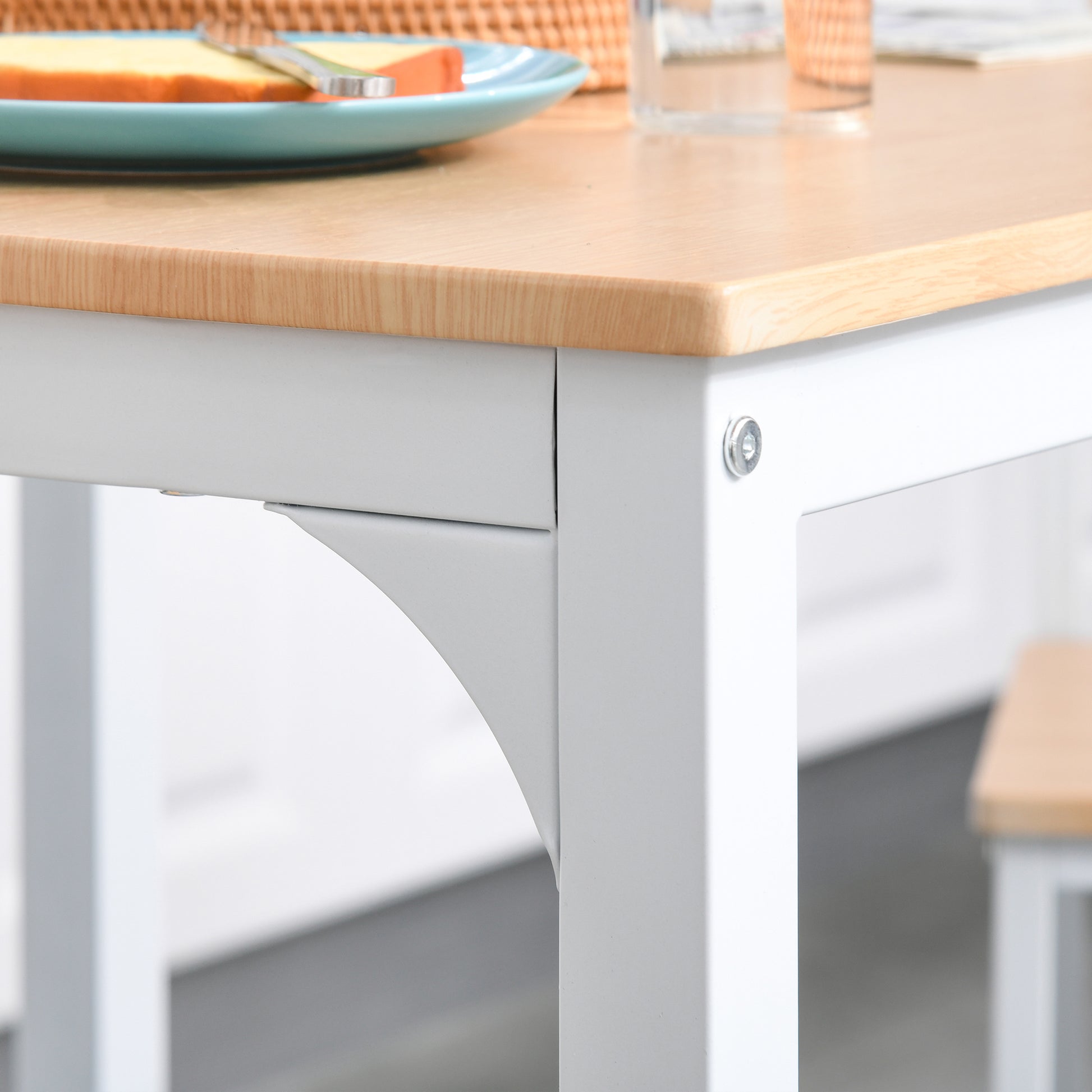 Light wood dining table with white metal legs