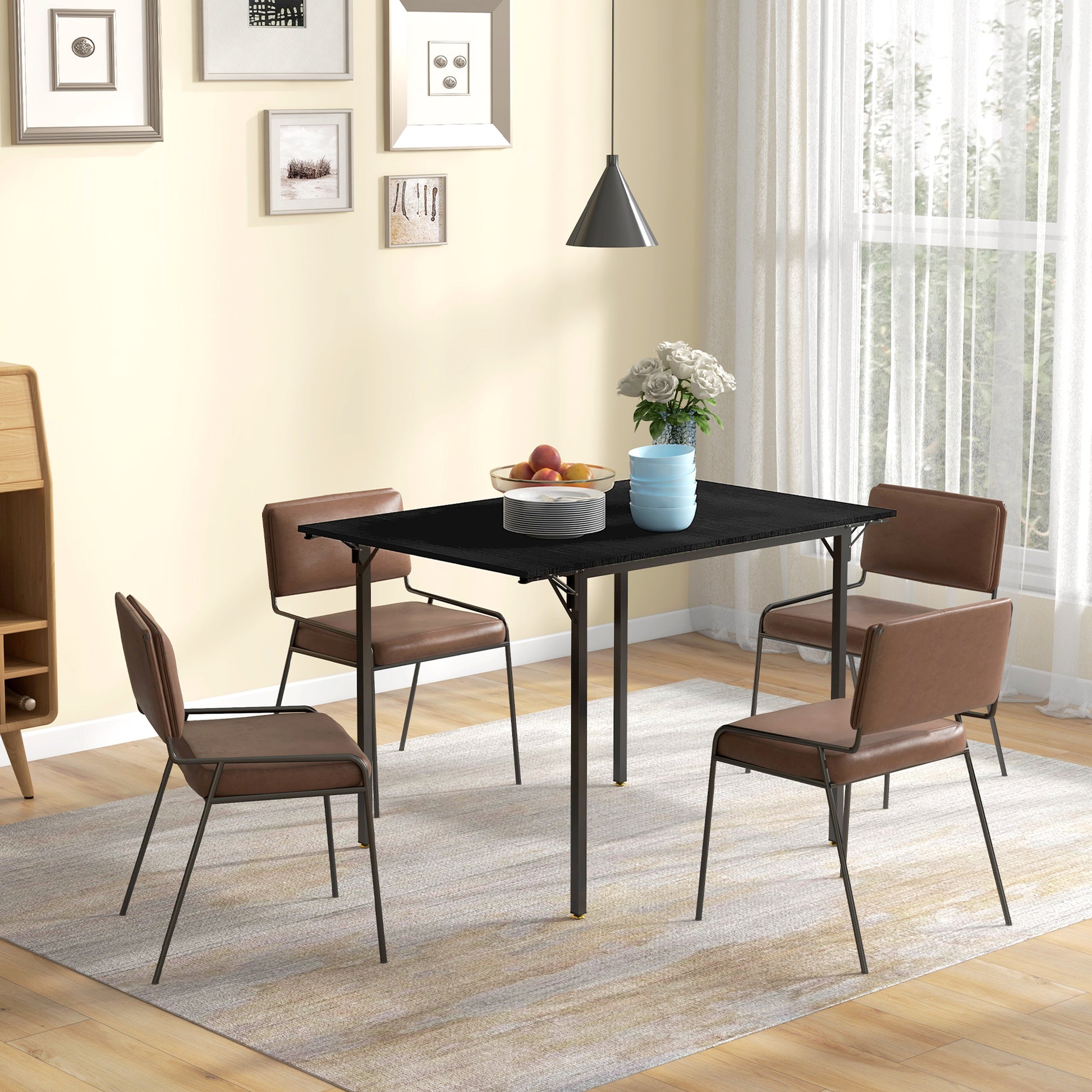 Black square dining table with four brown faux leather chairs and minimalist metal frames