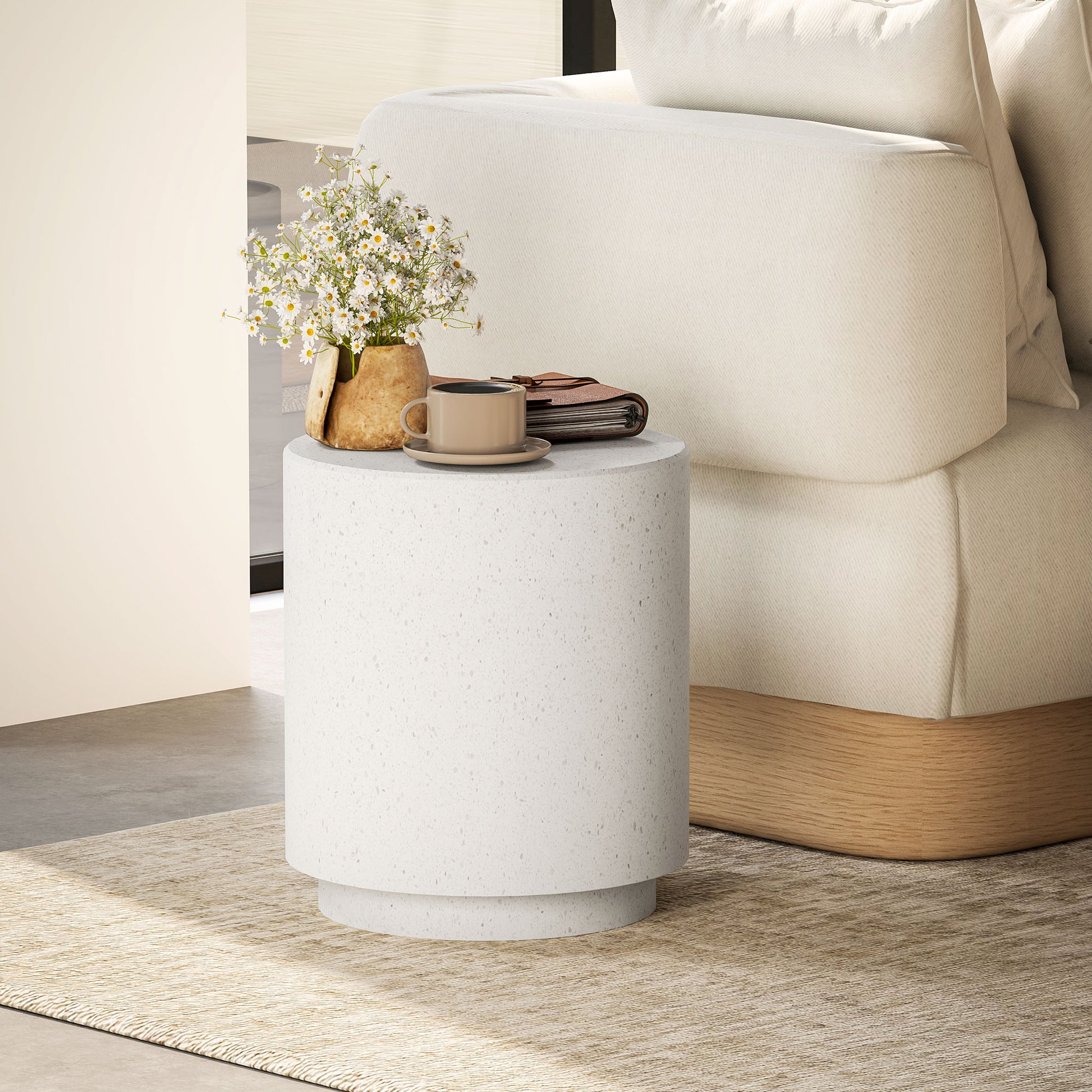 White terrazzo round side table with a textured finish perfect for modern living rooms