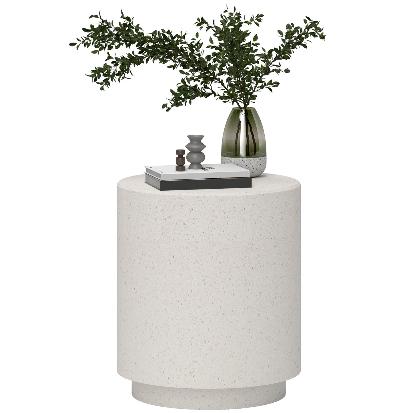 White speckled round side table with decorative items