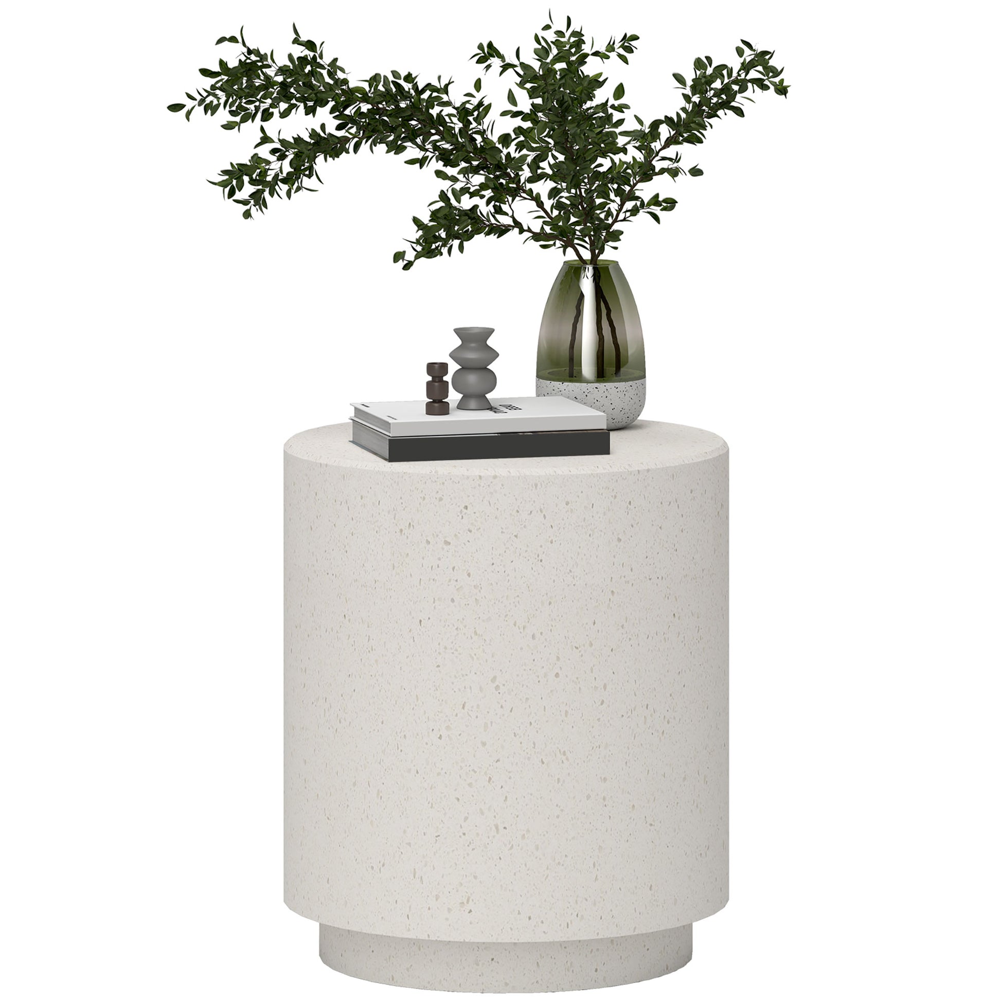 White speckled round side table with decorative items
