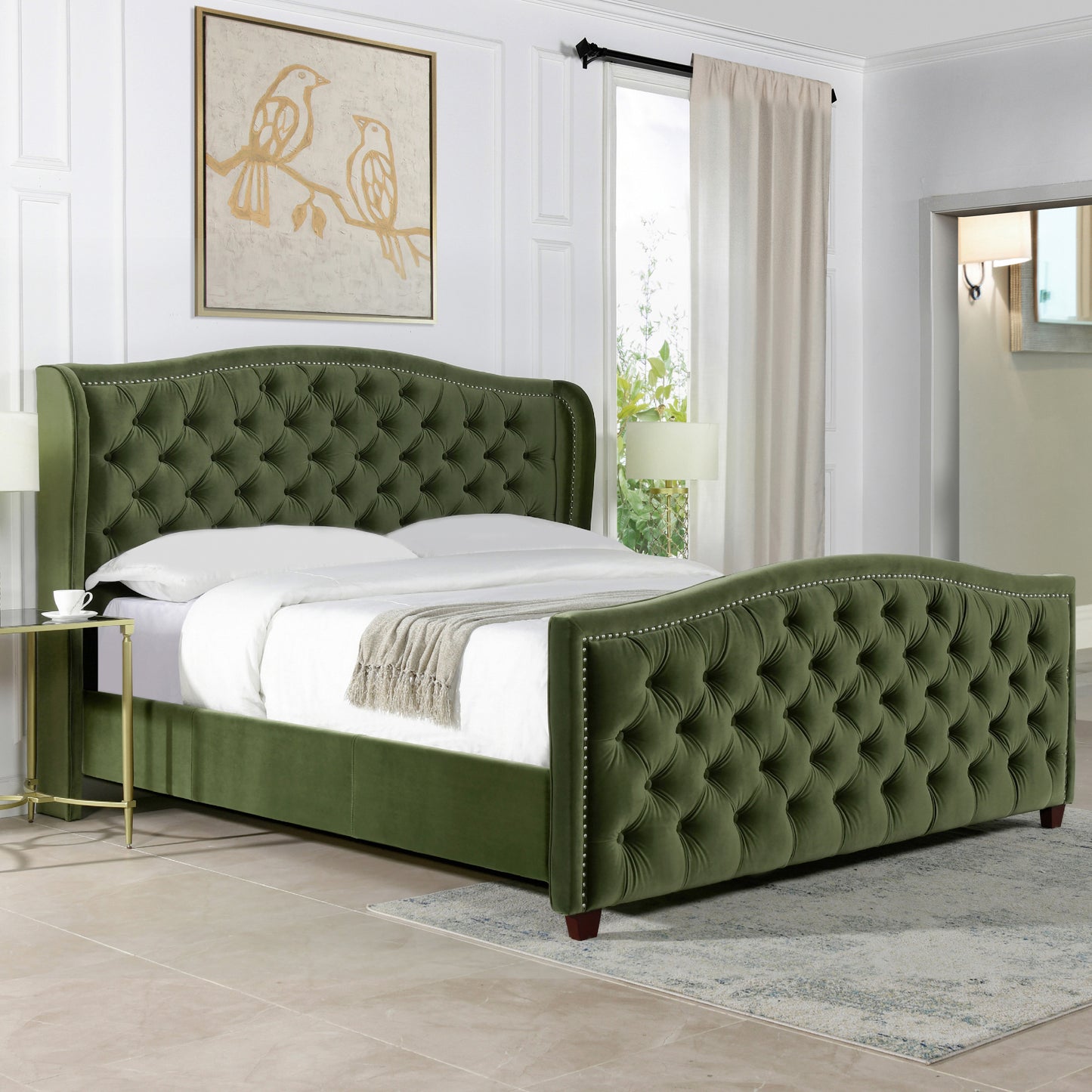 Green velvet tufted wingback bed with silver nailhead trim