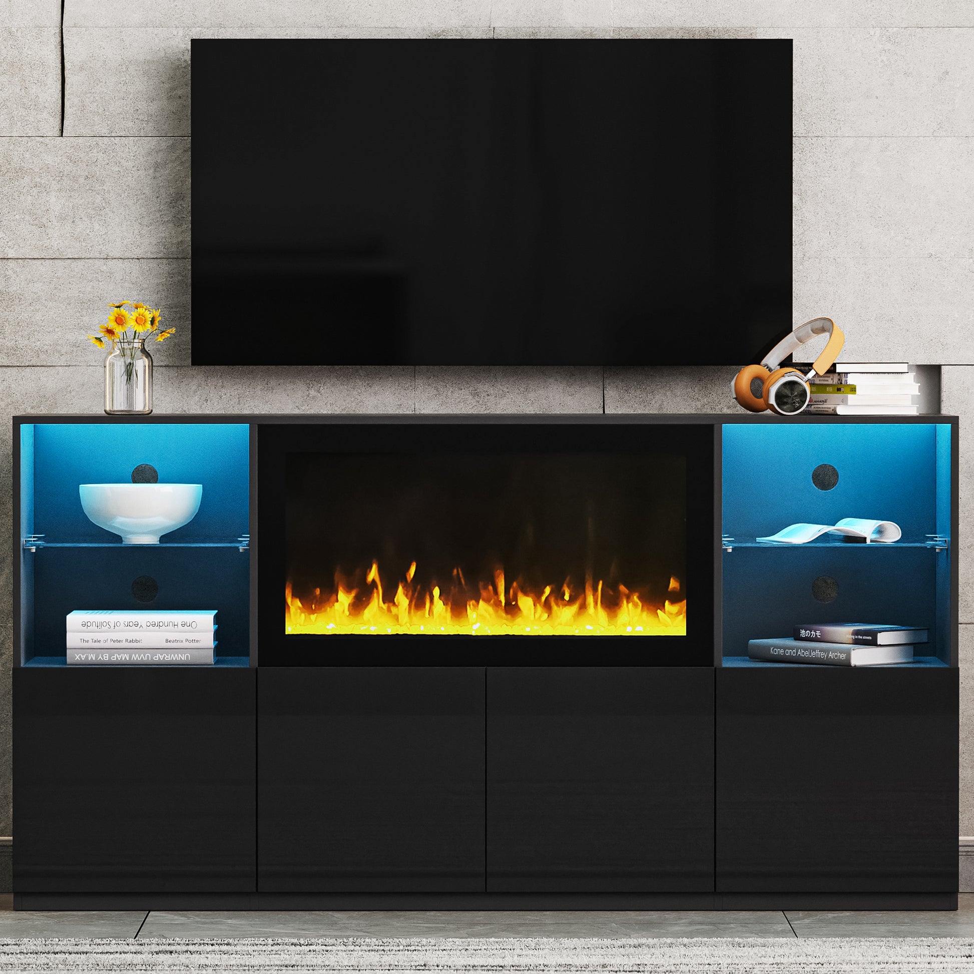 Black media console with electric fireplace and blue LED lights