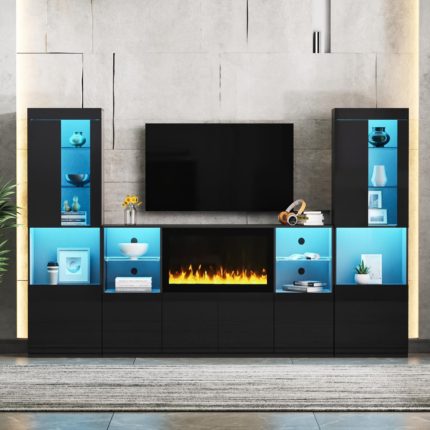 Black entertainment center with electric fireplace and blue LED lighting