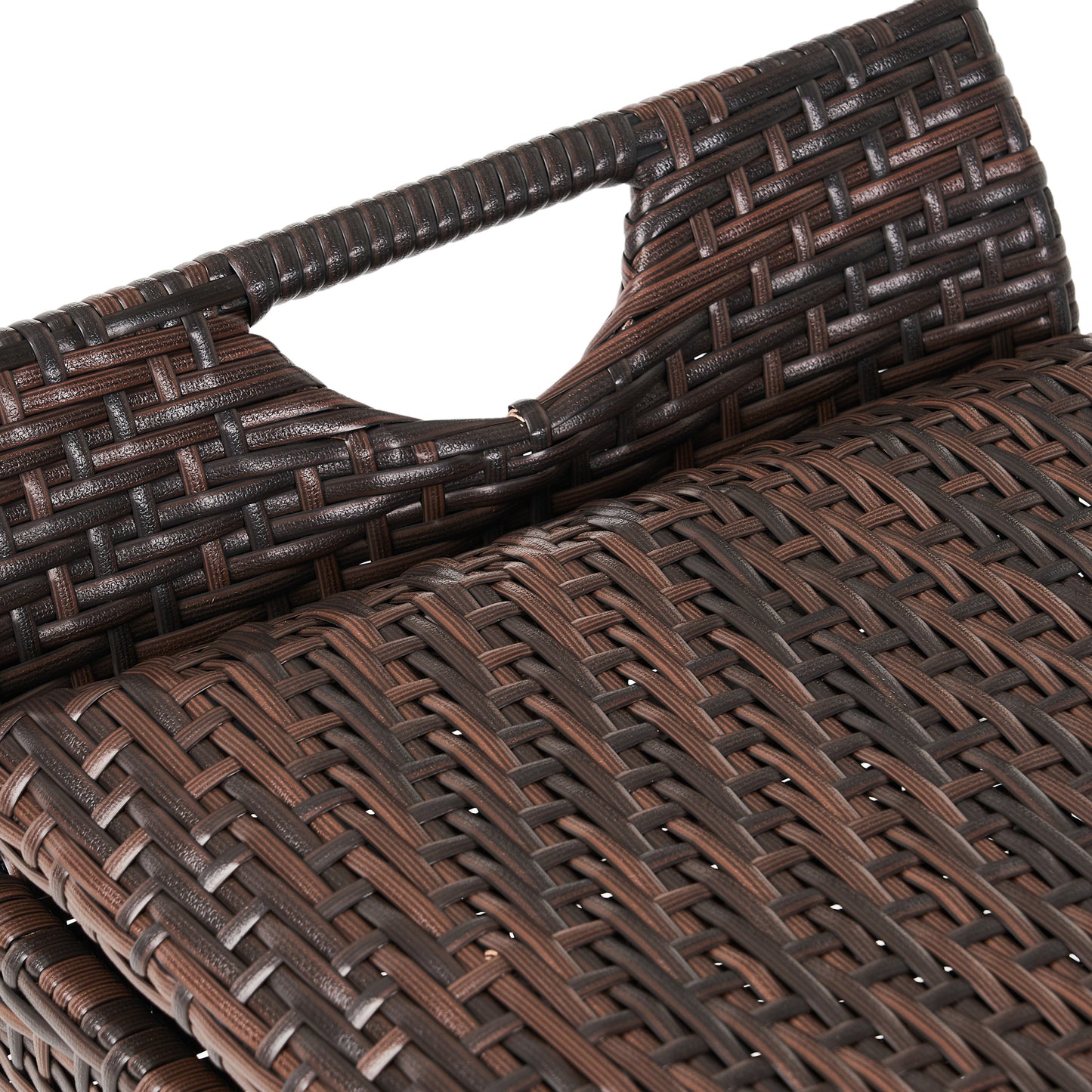 Closeup of dark brown woven wicker basket with integrated handle showcasing texture