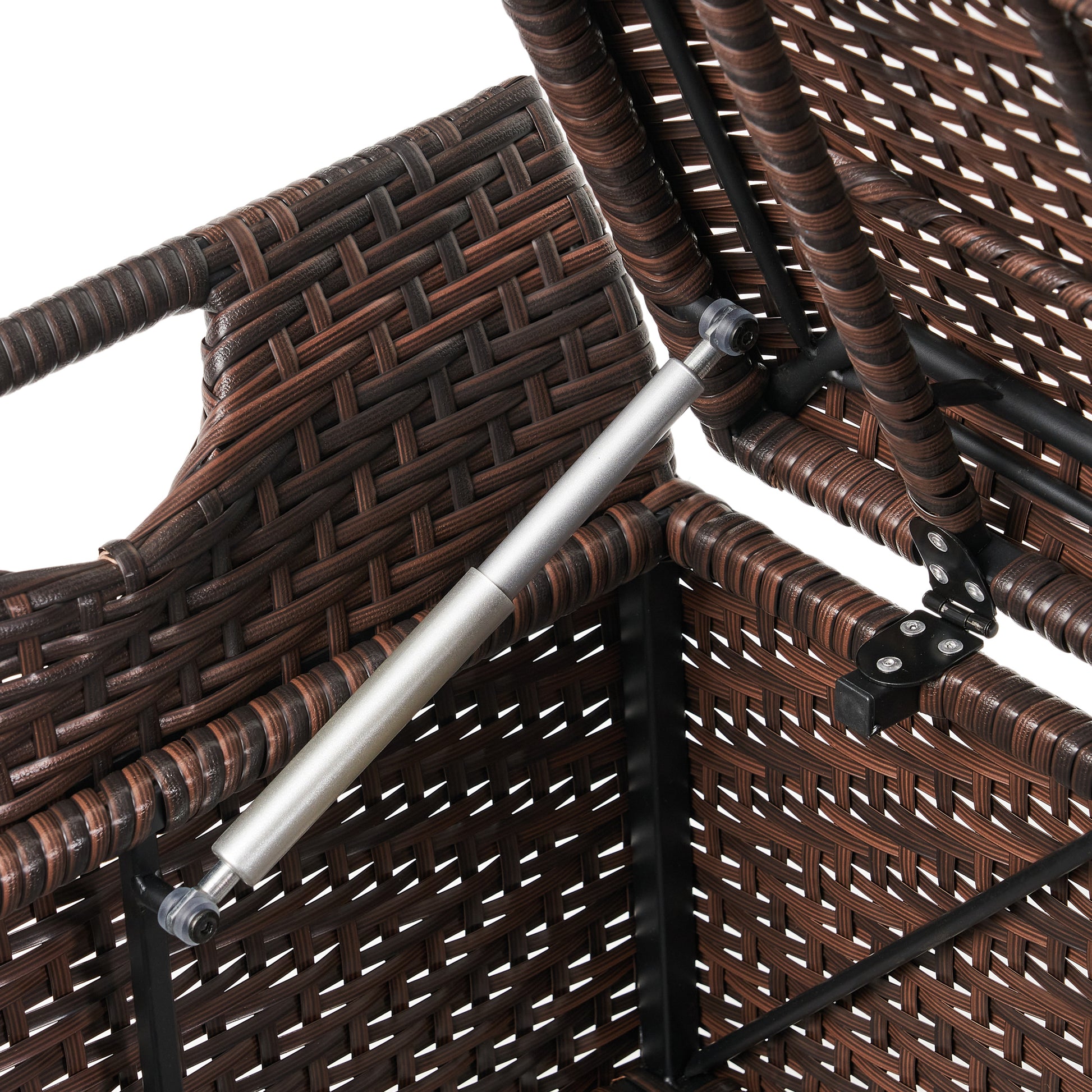 Brown wicker storage chest detail with gas lift support