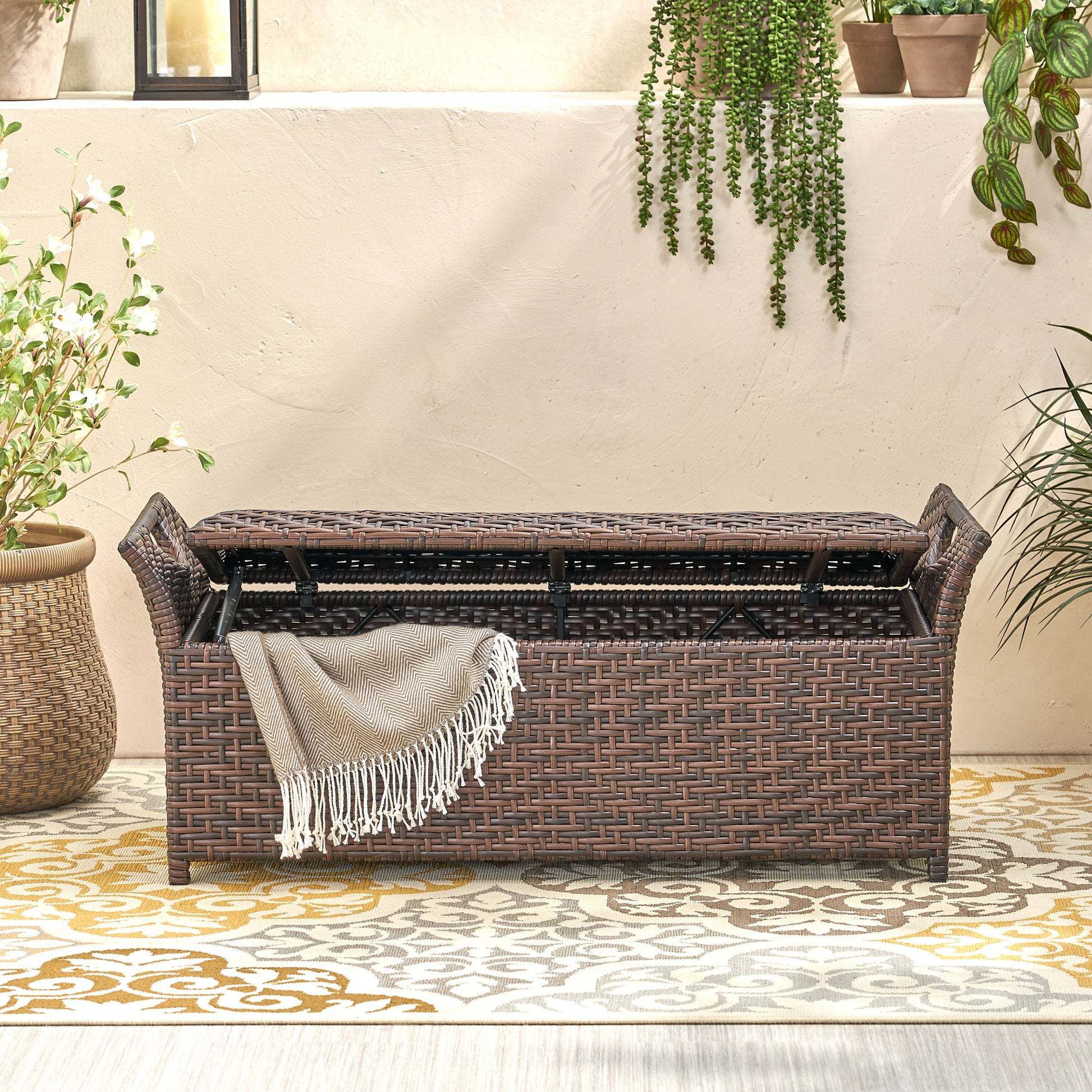 Dark brown wicker storage bench with hinged lid