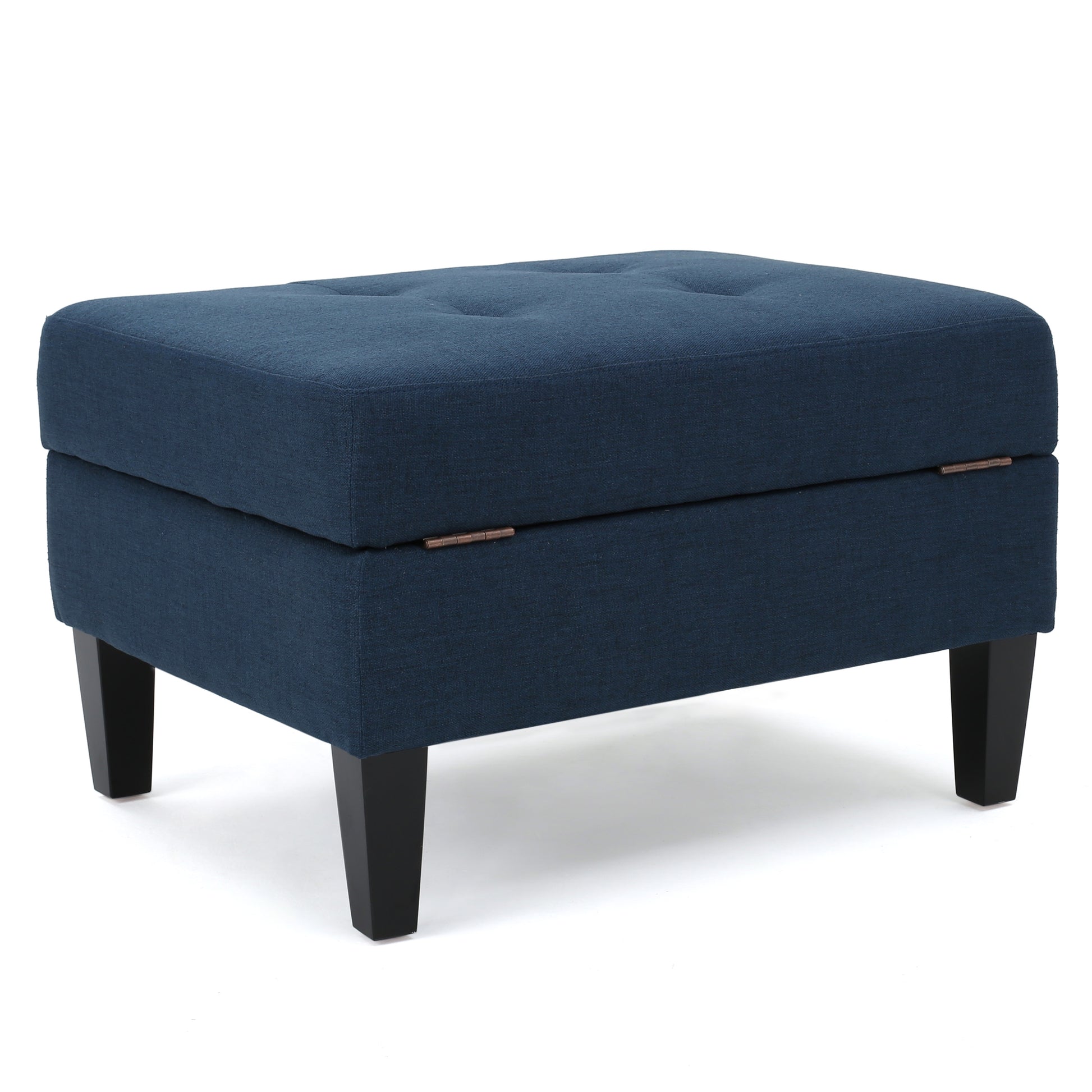 Navy blue fabric storage ottoman with tufted top and tapered black legs