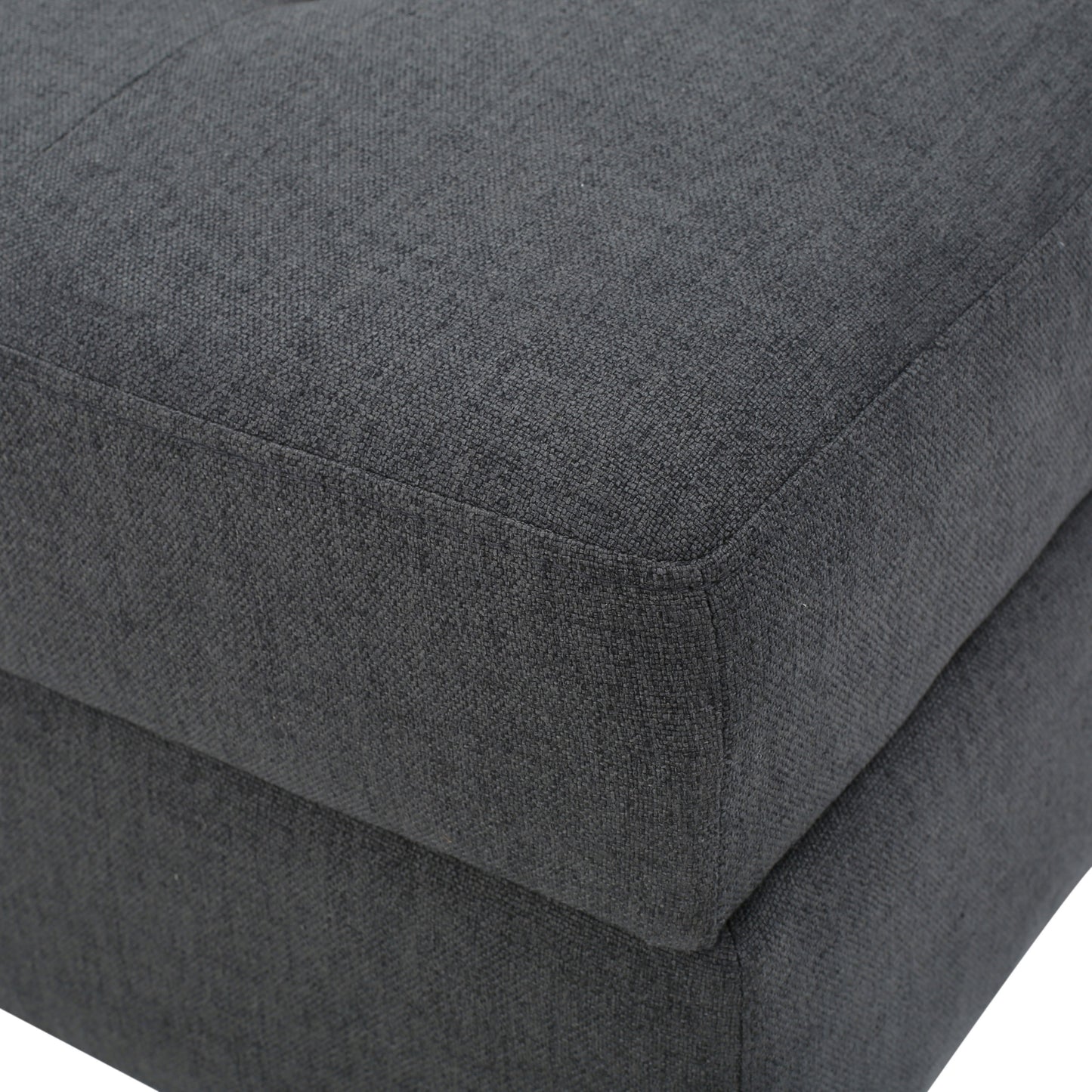 Dark gray fabric ottoman corner detail