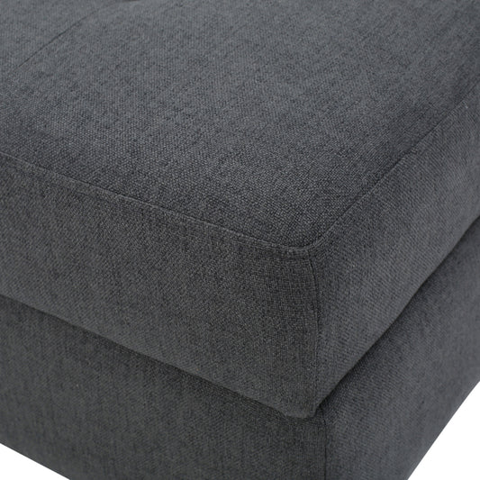 Dark gray fabric ottoman corner detail