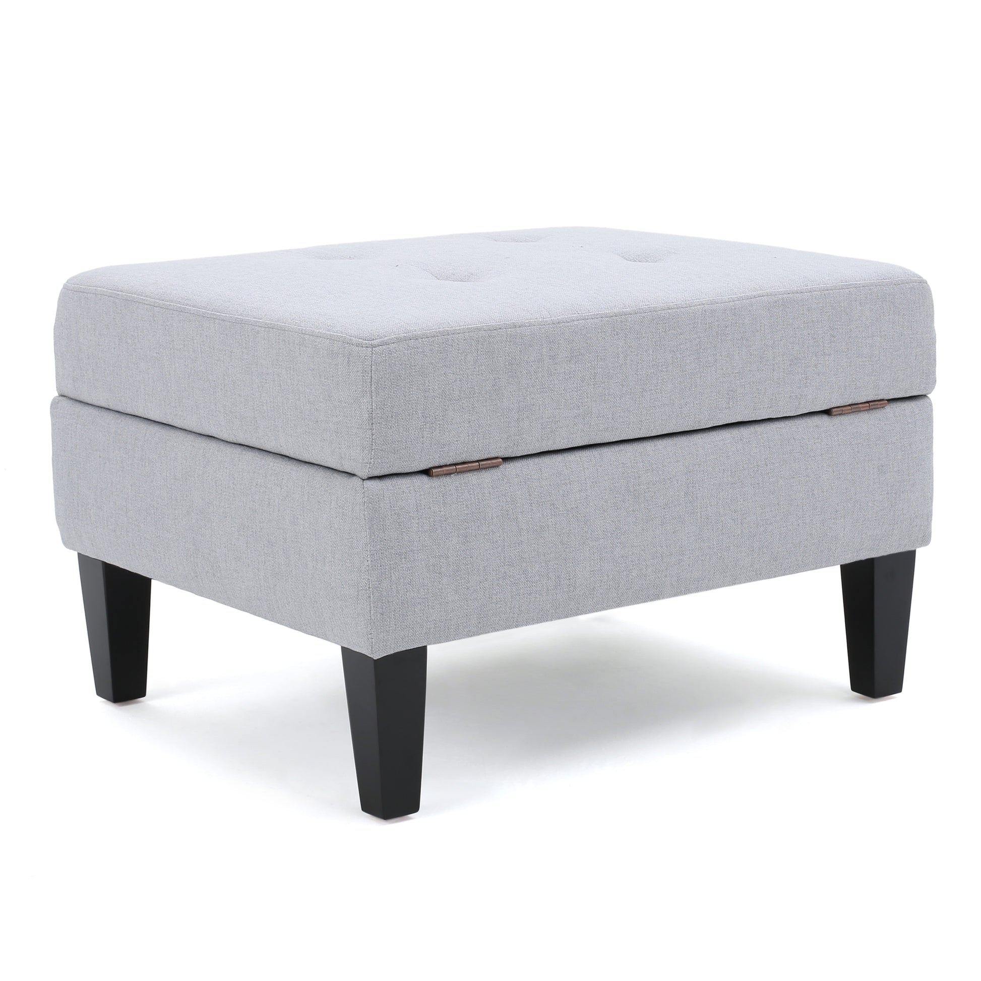 Light gray tufted storage ottoman with black tapered legs