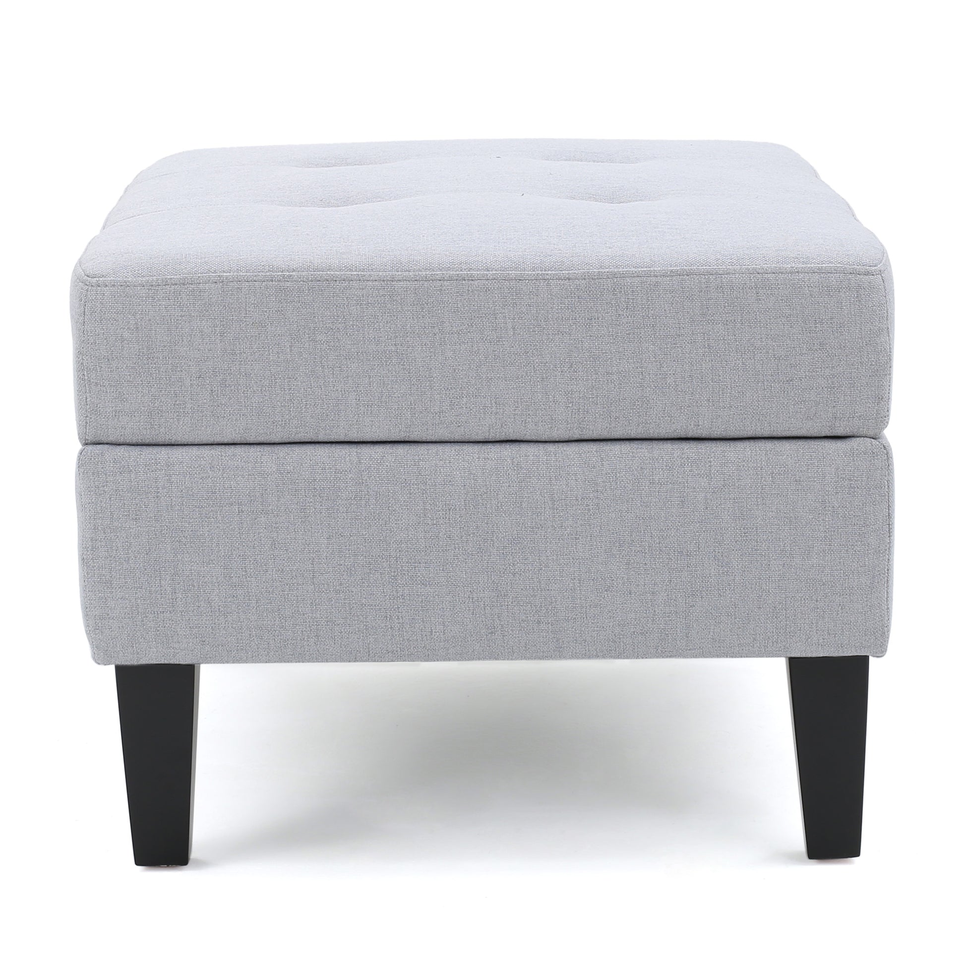 Tufted grey fabric storage ottoman with black tapered legs