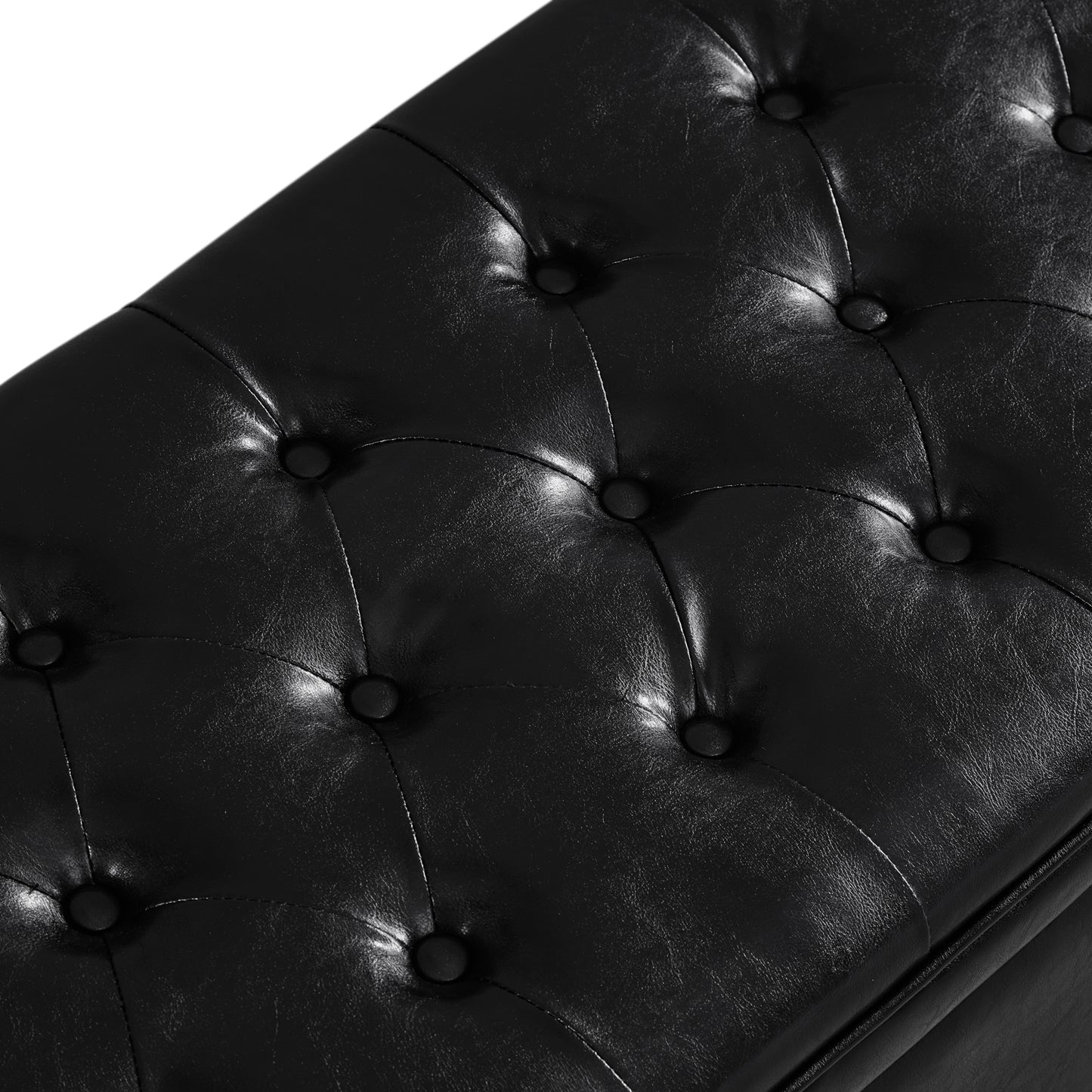 Black faux leather tufted ottoman