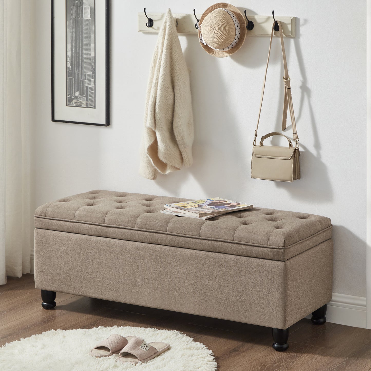 Tufted beige storage ottoman with dark wooden legs