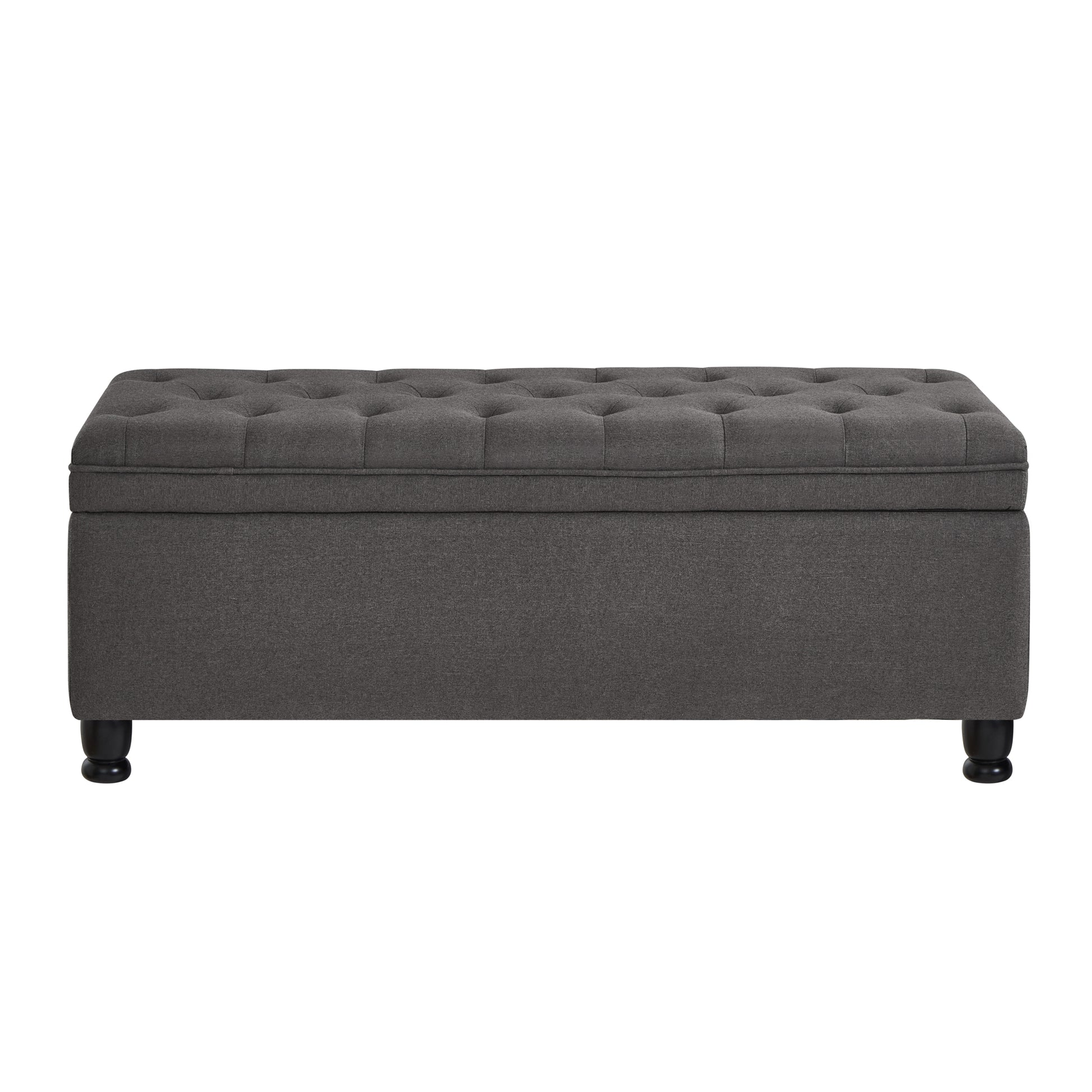 Dark grey fabric storage ottoman with tufted lid and dark wooden legs