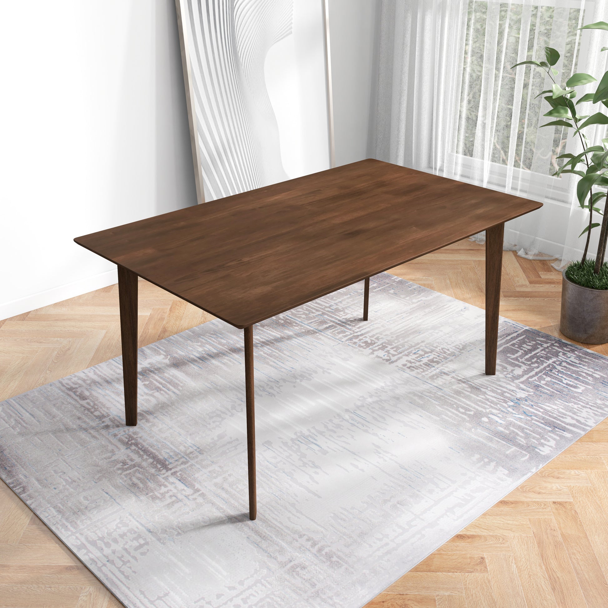 Dark wood dining table with tapered legs on a patterned rug