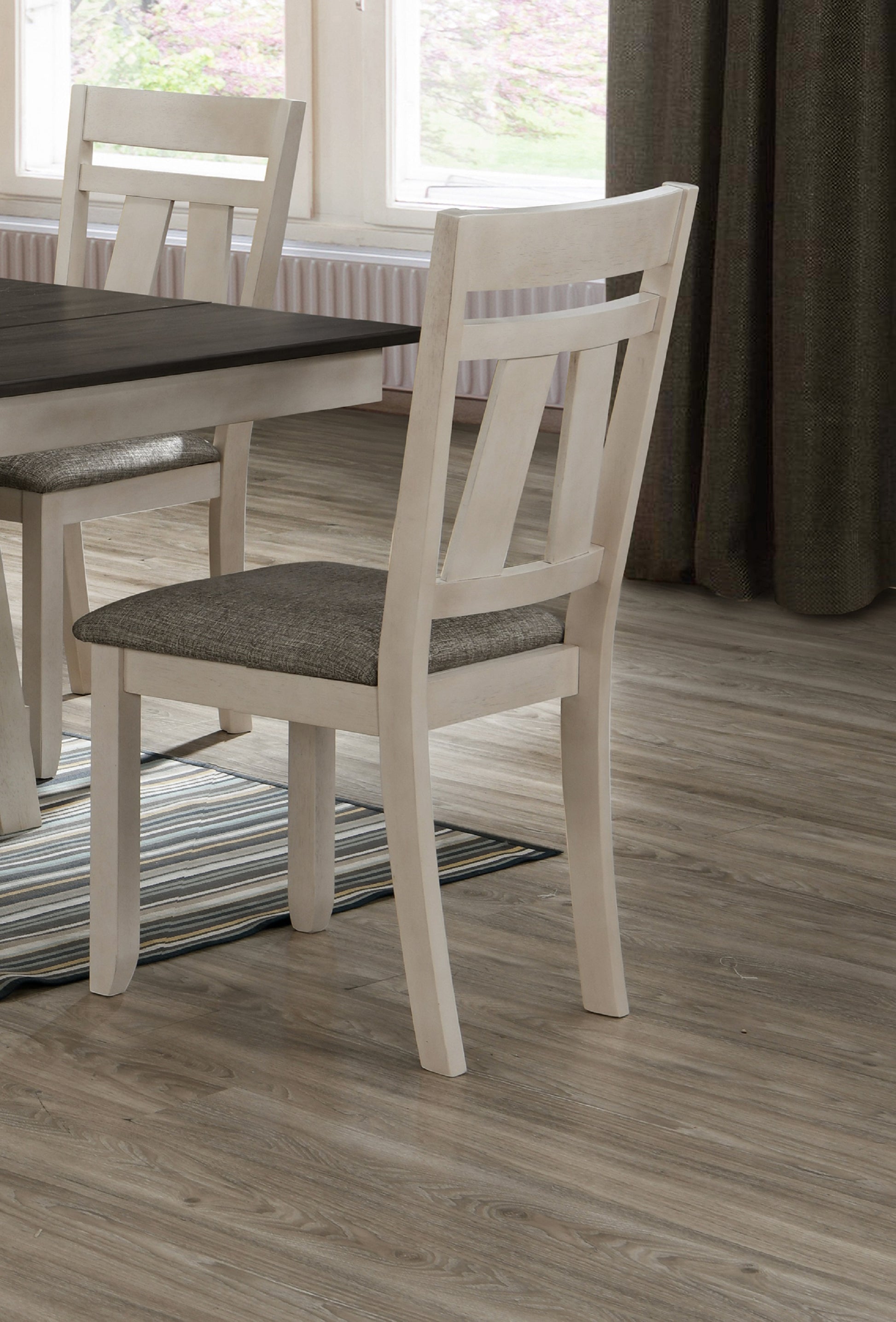 Cream distressed wood dining chair with grey upholstered seat