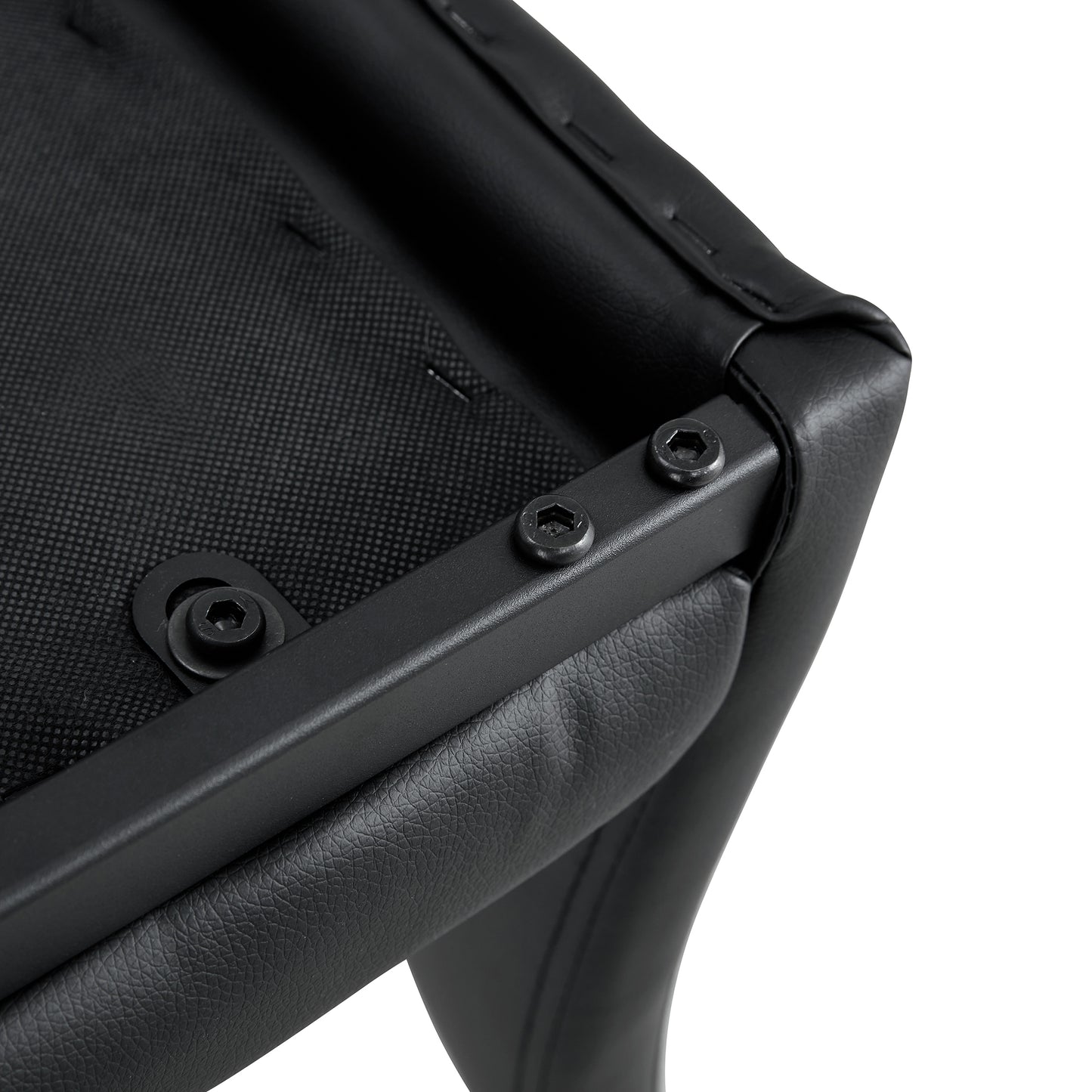 Black leather seat upholstery detail with visible stitching and metal frame