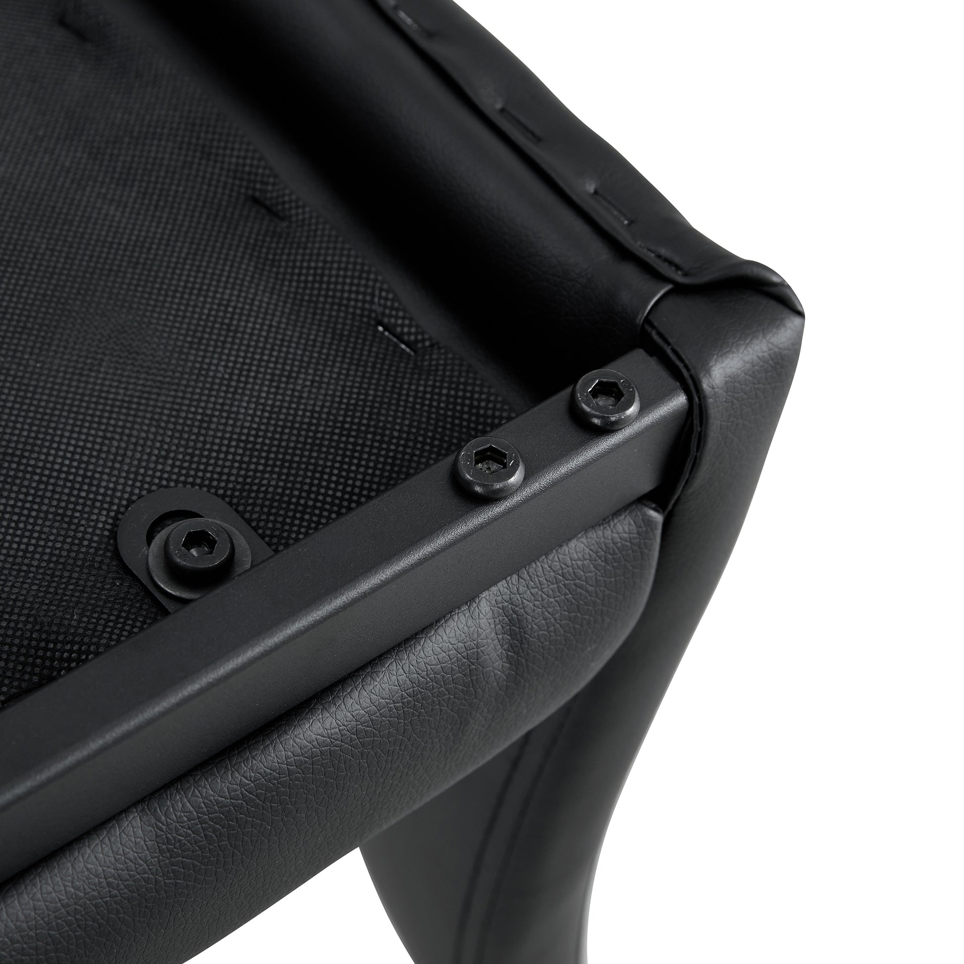 Black leather seat upholstery detail with visible stitching and metal frame
