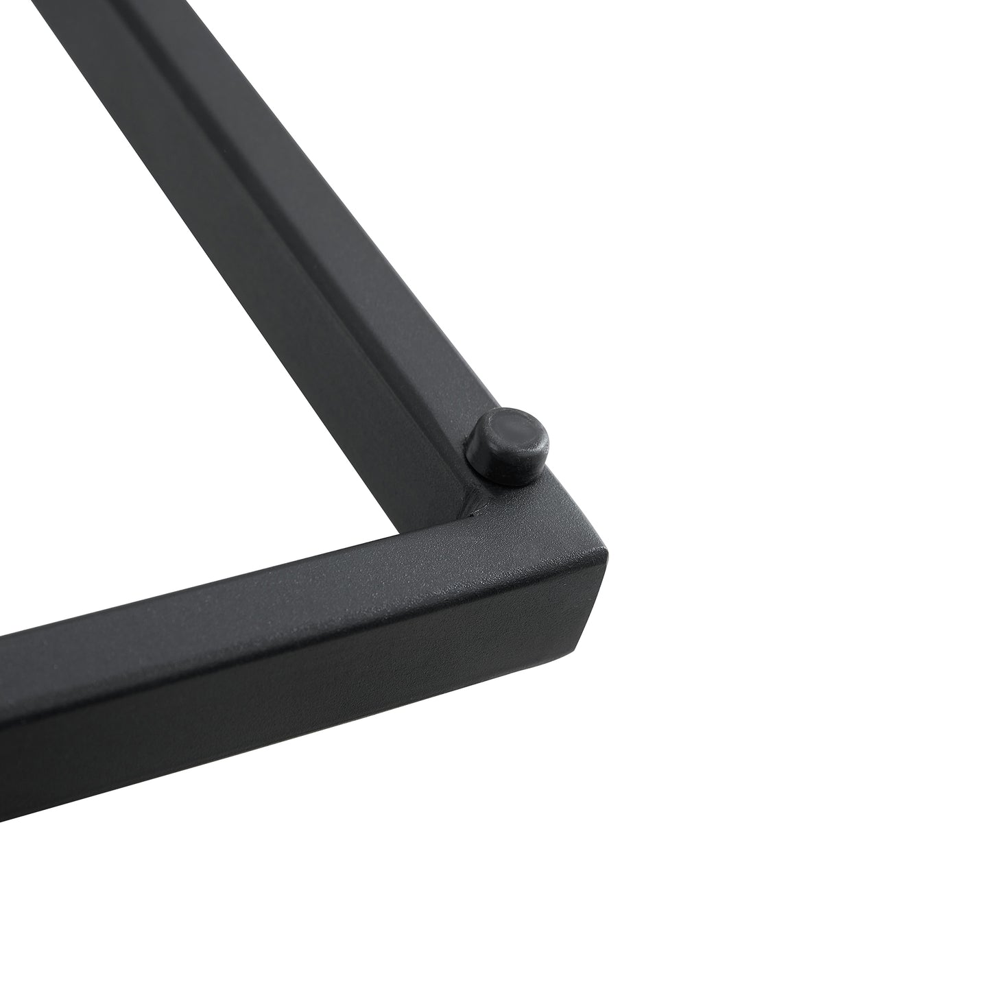 Closeup of black metal shelf bracket corner with rubber foot
