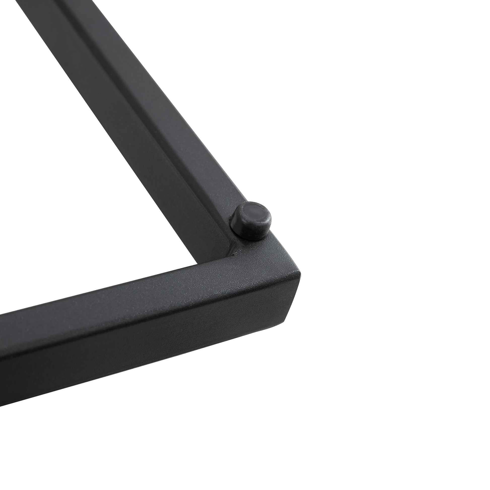 Closeup of black metal shelf bracket corner with rubber foot
