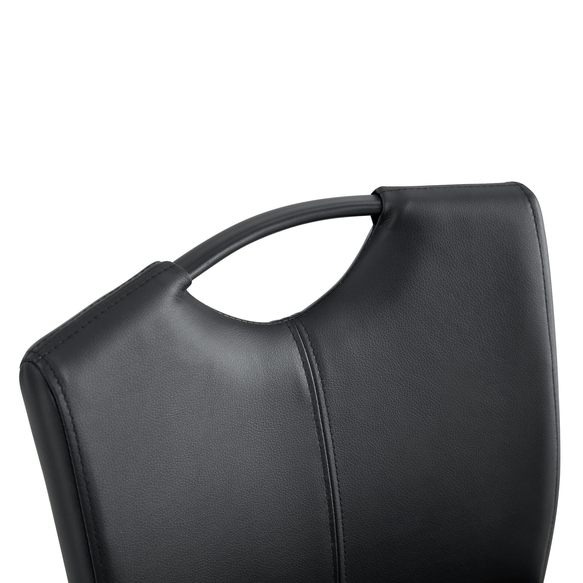 Black faux leather chair back with curved handle detail