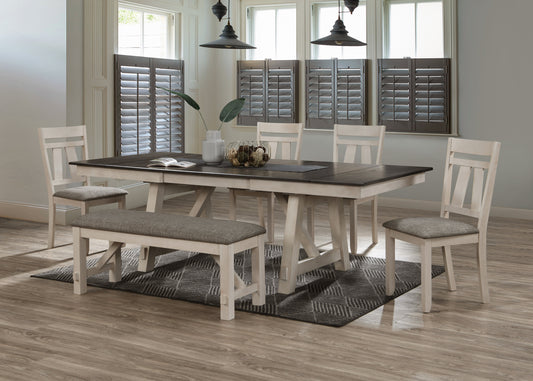 Rustic farmhouse dining table with twotone finish and upholstered bench