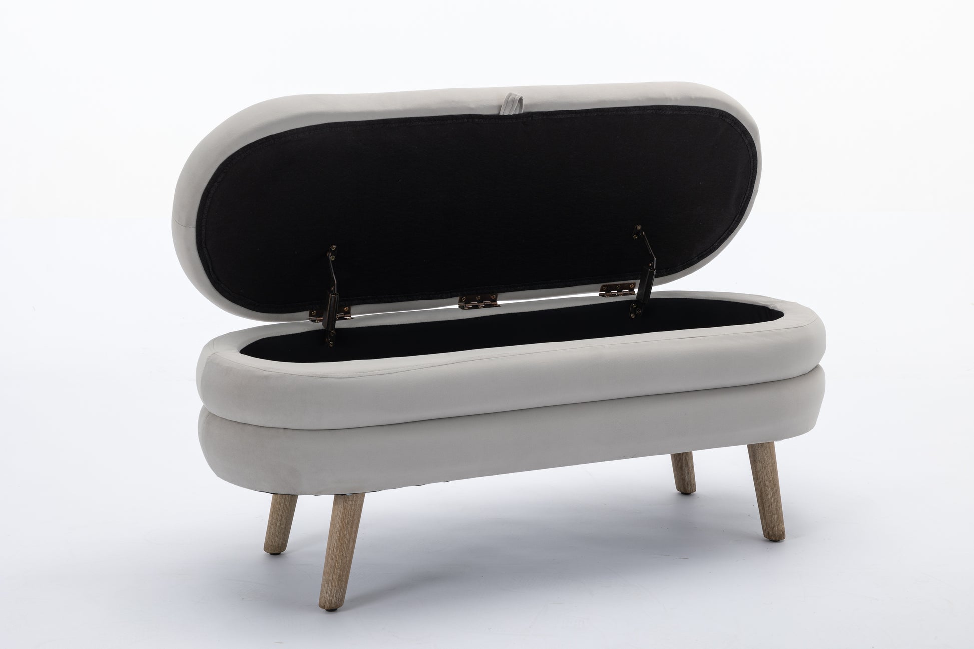 Light grey upholstered storage bench with open lid and wooden legs